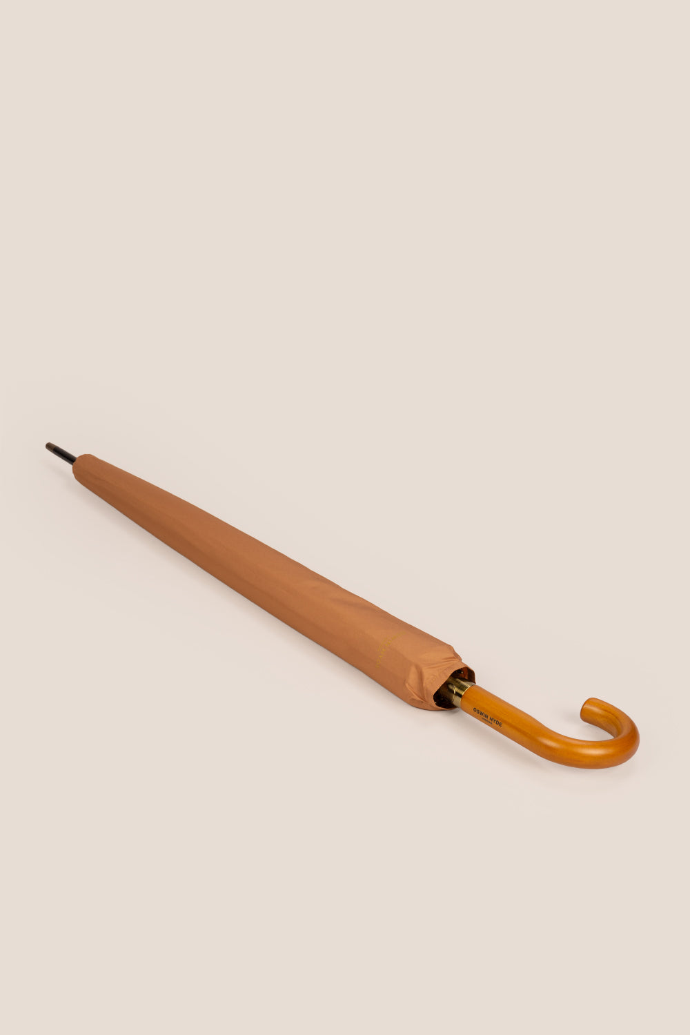 Joseph Sand men’s windproof umbrella with wooden J-handle, combining classic style and durable construction for elegant all-weather protection.