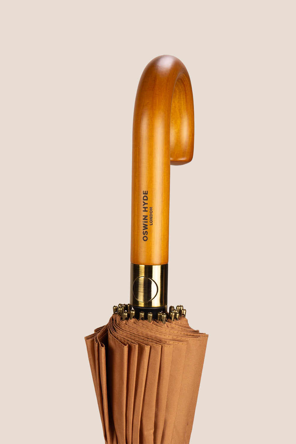 Joseph Sand men’s windproof umbrella with wooden J-handle, combining classic style and durable construction for elegant all-weather protection.