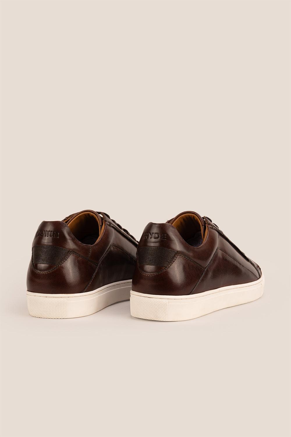 Hayes Brown leather sneakers for men, designed with a classic seven-eyelet style that enhances your everyday attire. Made from premium leather
