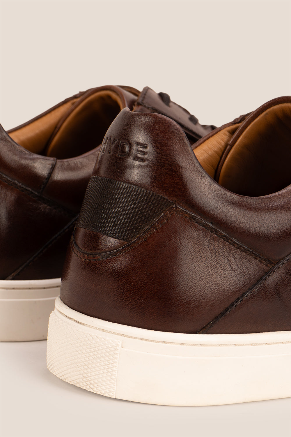 Hayes Brown leather sneakers for men, designed with a classic seven-eyelet style that enhances your everyday attire. Made from premium leather