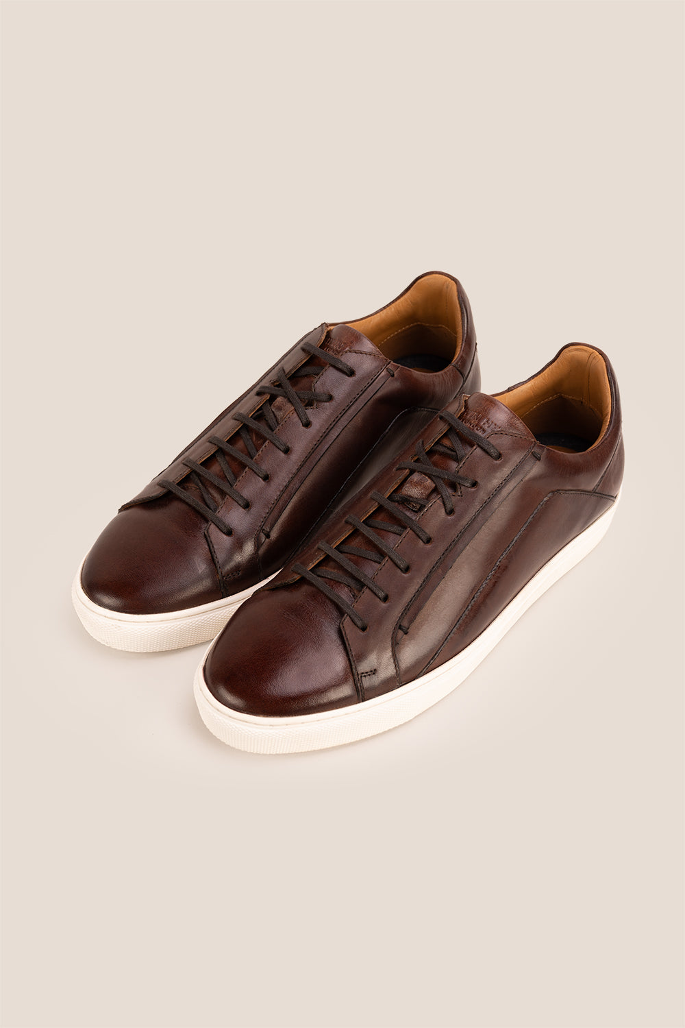 Hayes Brown leather sneakers for men, designed with a classic seven-eyelet style that enhances your everyday attire. Made from premium leather