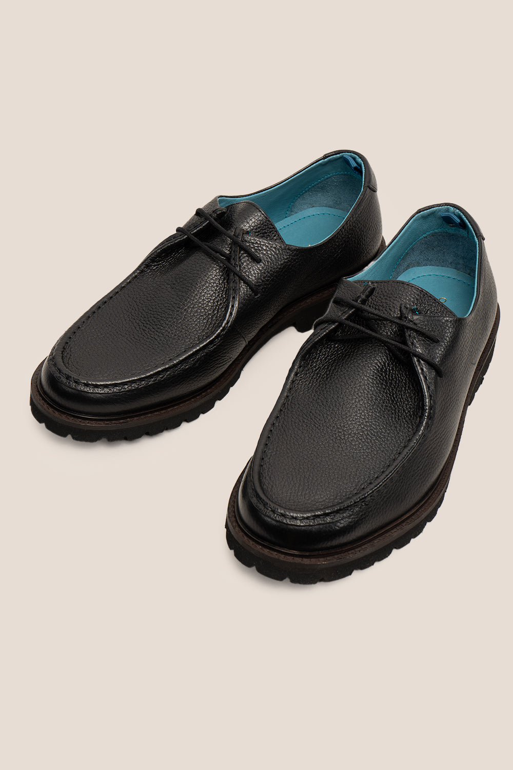 Joshua black leather Wallabee shoes for men by Oswin Hyde – casual luxury footwear with moccasin-style stitching and premium comfort.