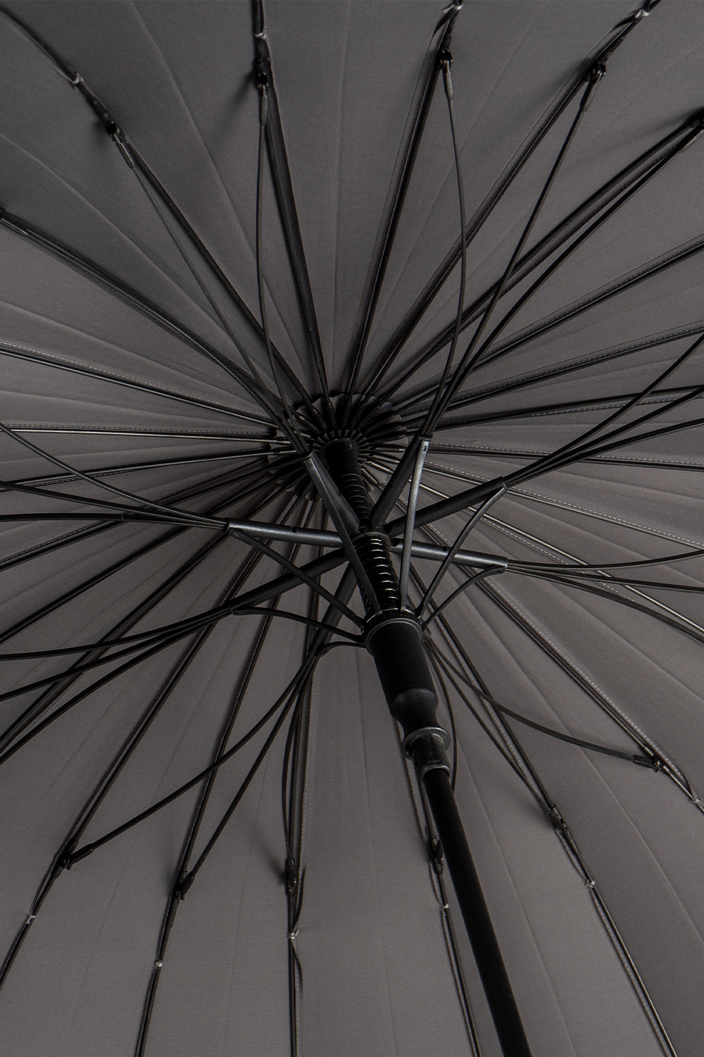 Joseph Grey men’s windproof umbrella with wooden J-handle, blending classic design with reliable durability for refined all-weather protection.