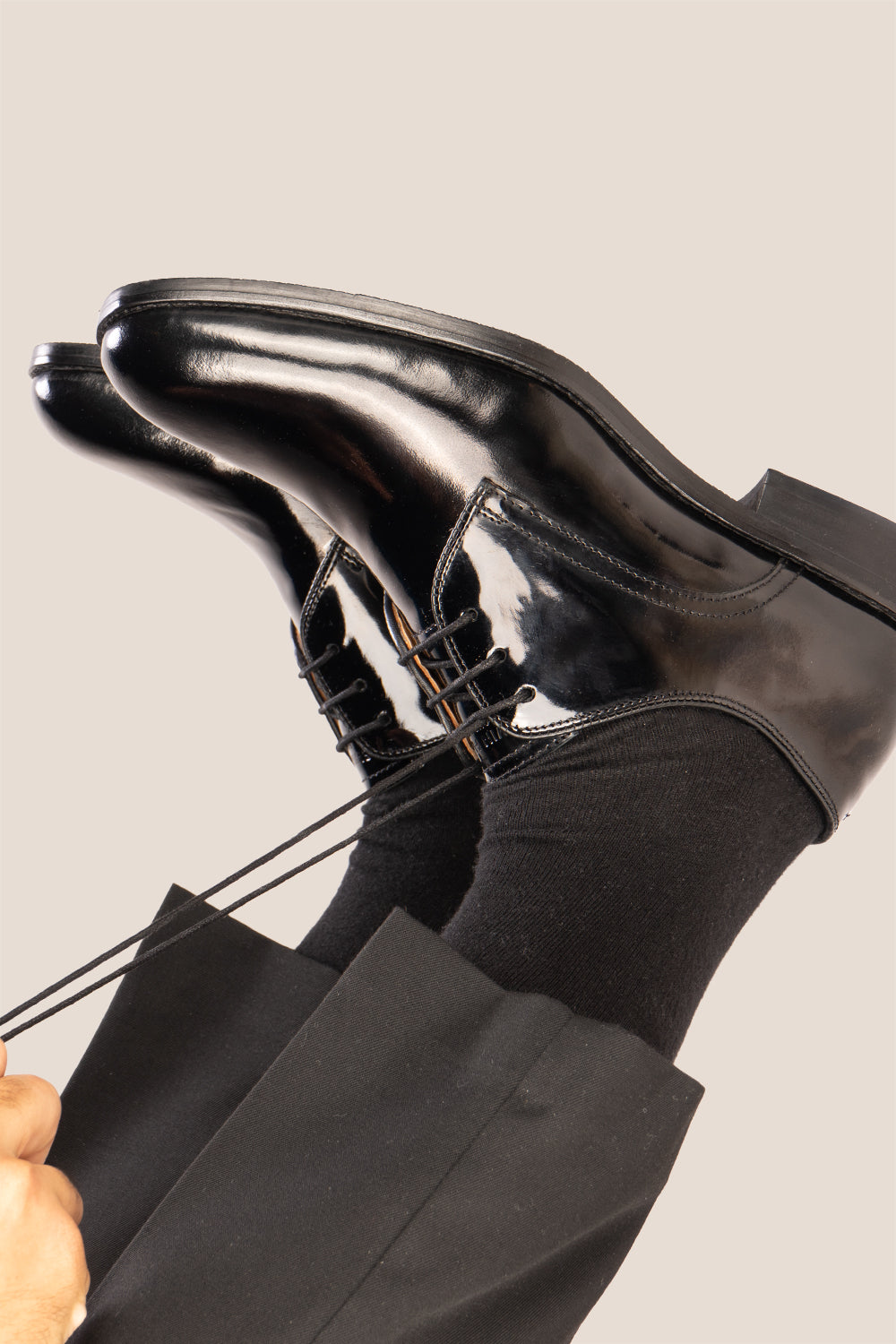 Edison Black patent derby men’s leather shoes with three-eyelet design and polished finish, perfect for formal occasions.