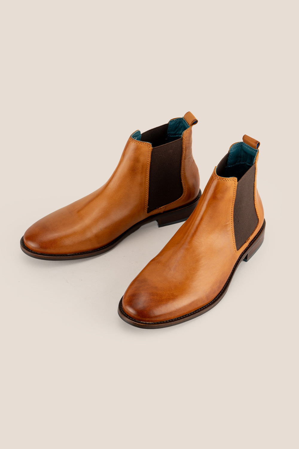 Douglas Tan leather Chelsea boots for men crafted from premium smooth leather with handmade detailing and high-quality sole for formal elegance.