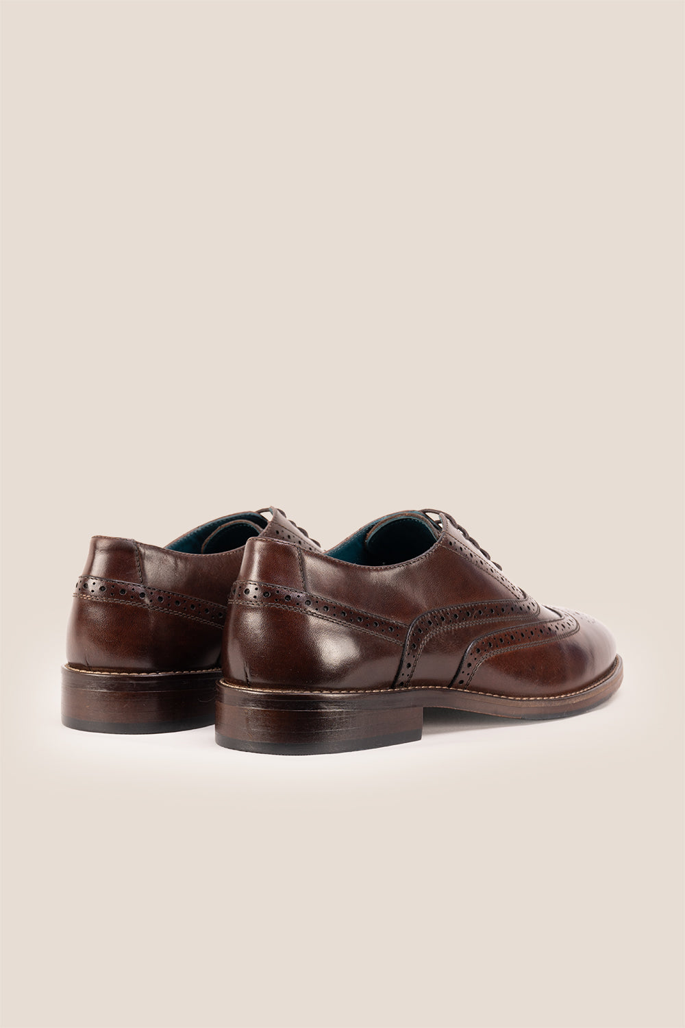 Experience comfort and style with the Winston Brown Wide Fit brogue. Premium leather, classic brogue detailing, and extra room for all-day wear.