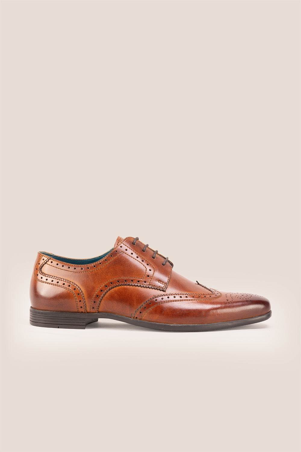 Miller Tan sophisticated derby brogue showcases expert craftsmanship that refuses to compromise on style or comfort.