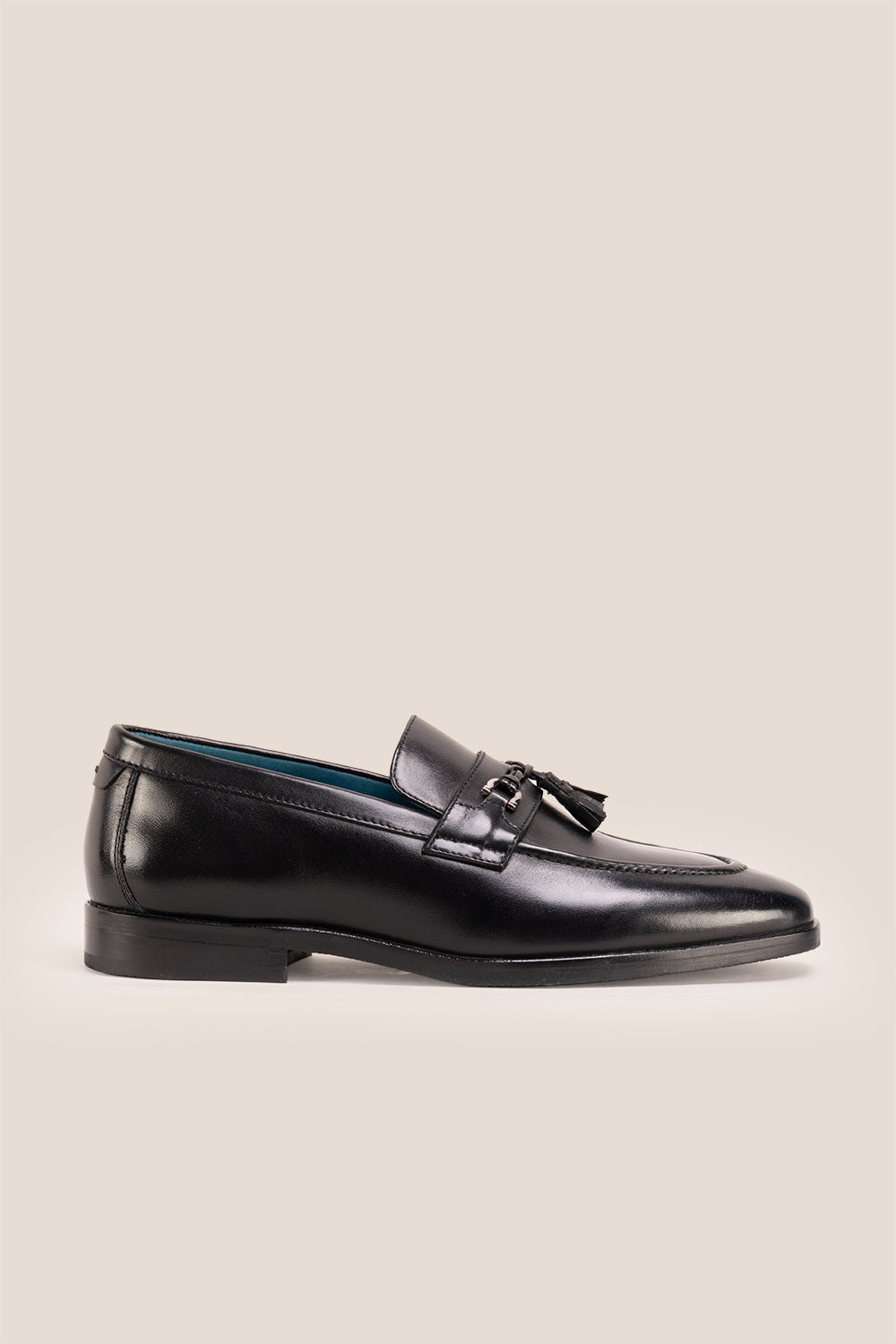 Emmet black leather loafers for men with trim and tassel detail, crafted from premium leather for refined casual and formal wear.