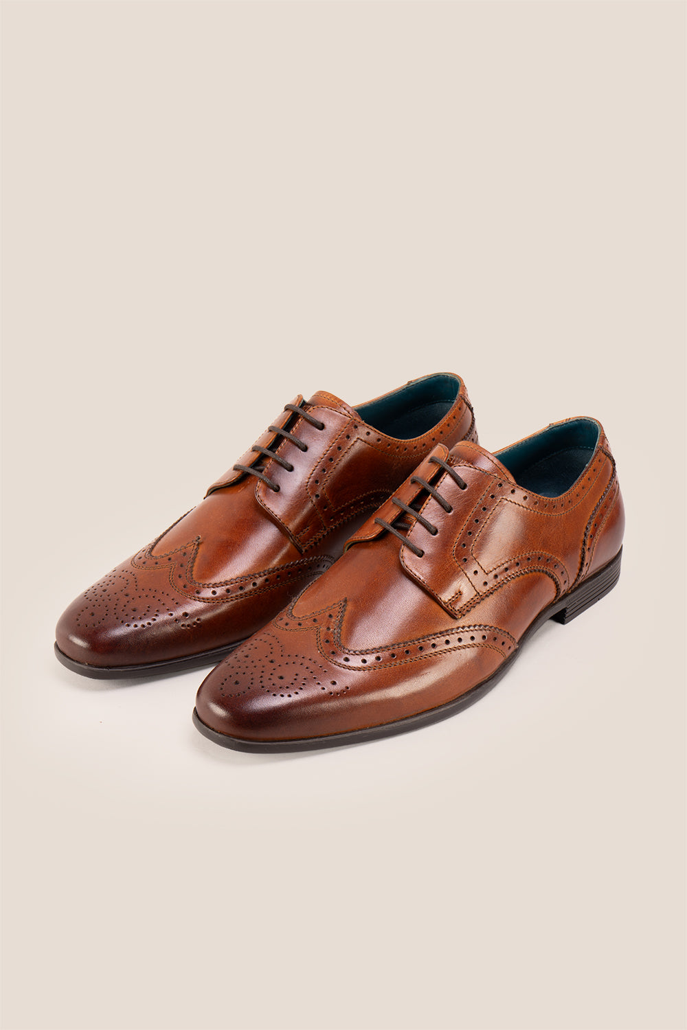 Miller Tan sophisticated derby brogue showcases expert craftsmanship that refuses to compromise on style or comfort.