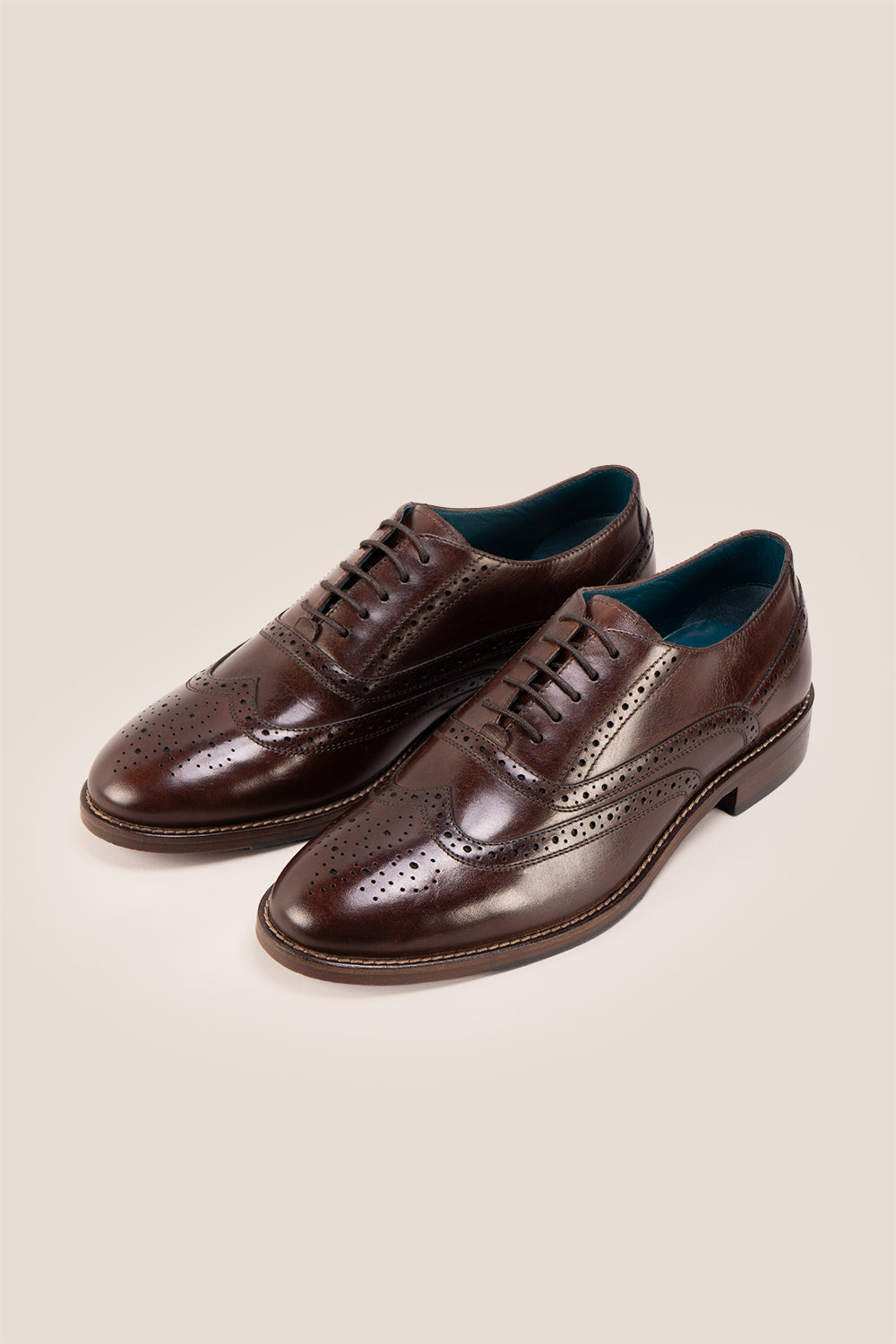 Experience comfort and style with the Winston Brown Wide Fit brogue. Premium leather, classic brogue detailing, and extra room for all-day wear.