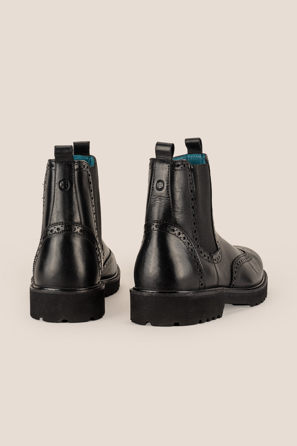 Grant Black men’s leather brogue Chelsea boots featuring a chunky sole, lightweight design, and comfortable fit for versatile smart-casual style.