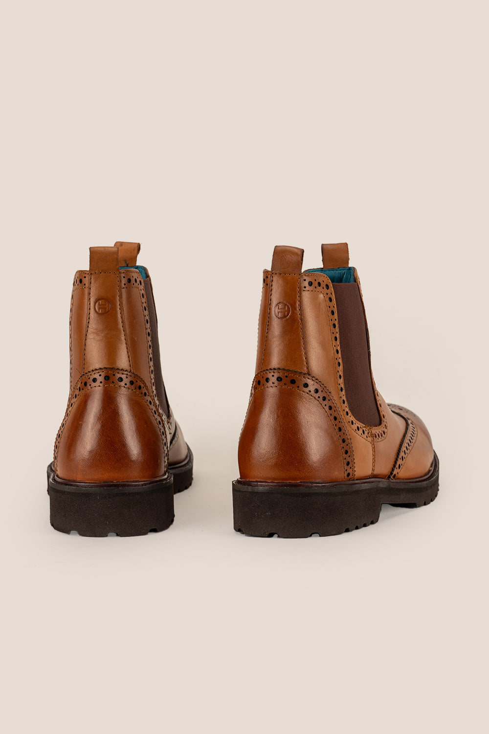 Grant Tan men’s leather brogue Chelsea boots featuring a chunky sole, lightweight design, and comfortable fit for smart casual occasions.