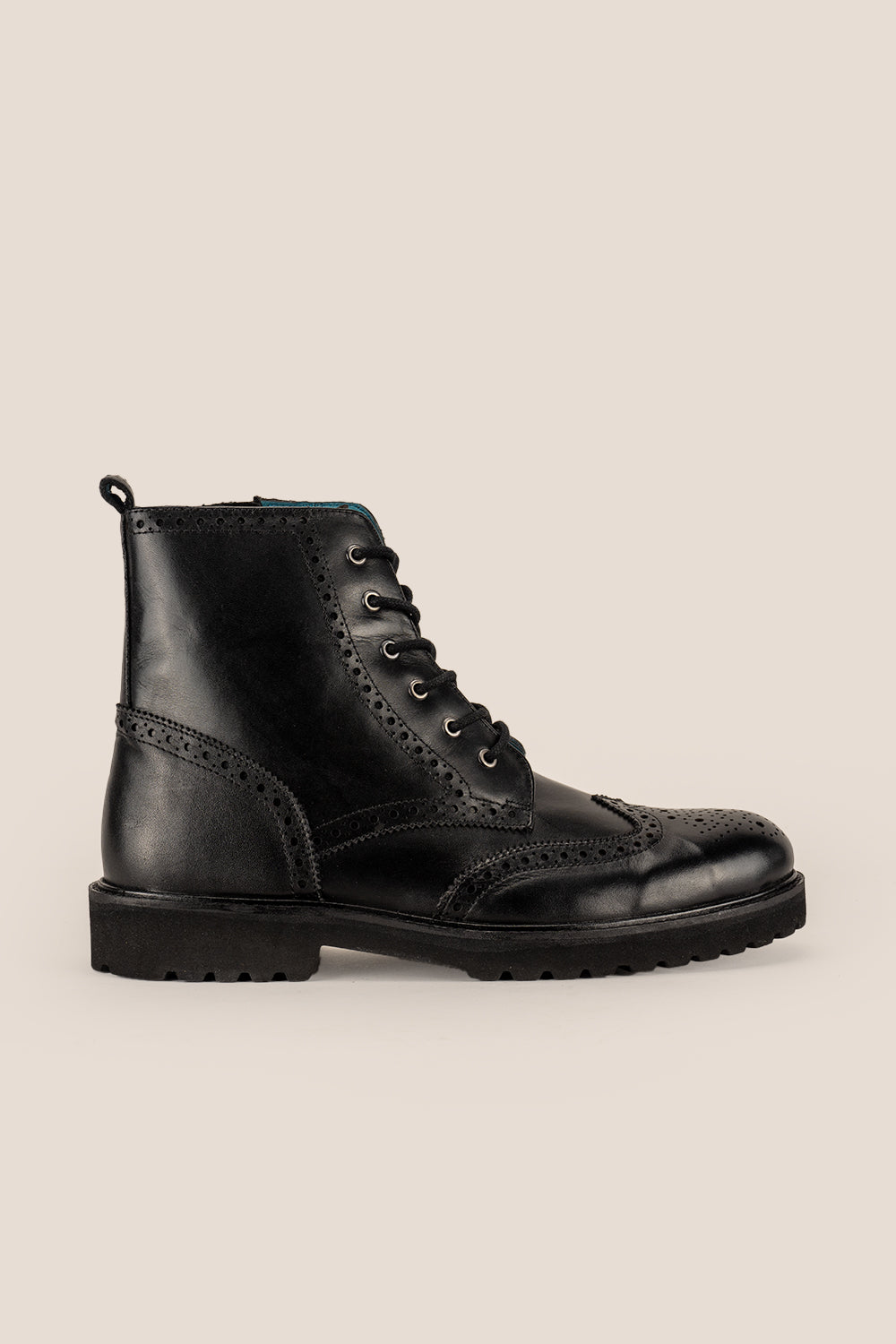 Black leather lace-up brogue boots for men by Oswin Hyde – comfortable, durable boots with wingtip detailing and cushioned insoles for everyday style.
