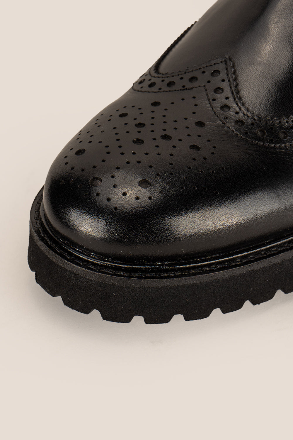 Grant Black men’s leather brogue Chelsea boots featuring a chunky sole, lightweight design, and comfortable fit for versatile smart-casual style.