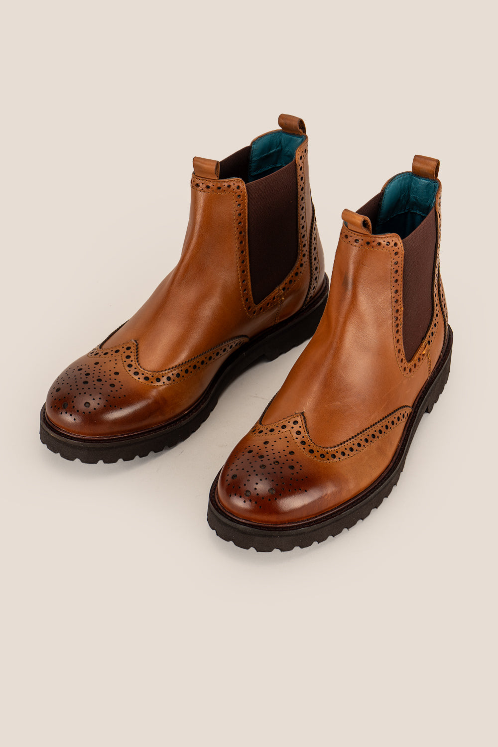 Grant Tan men’s leather brogue Chelsea boots featuring a chunky sole, lightweight design, and comfortable fit for smart casual occasions.