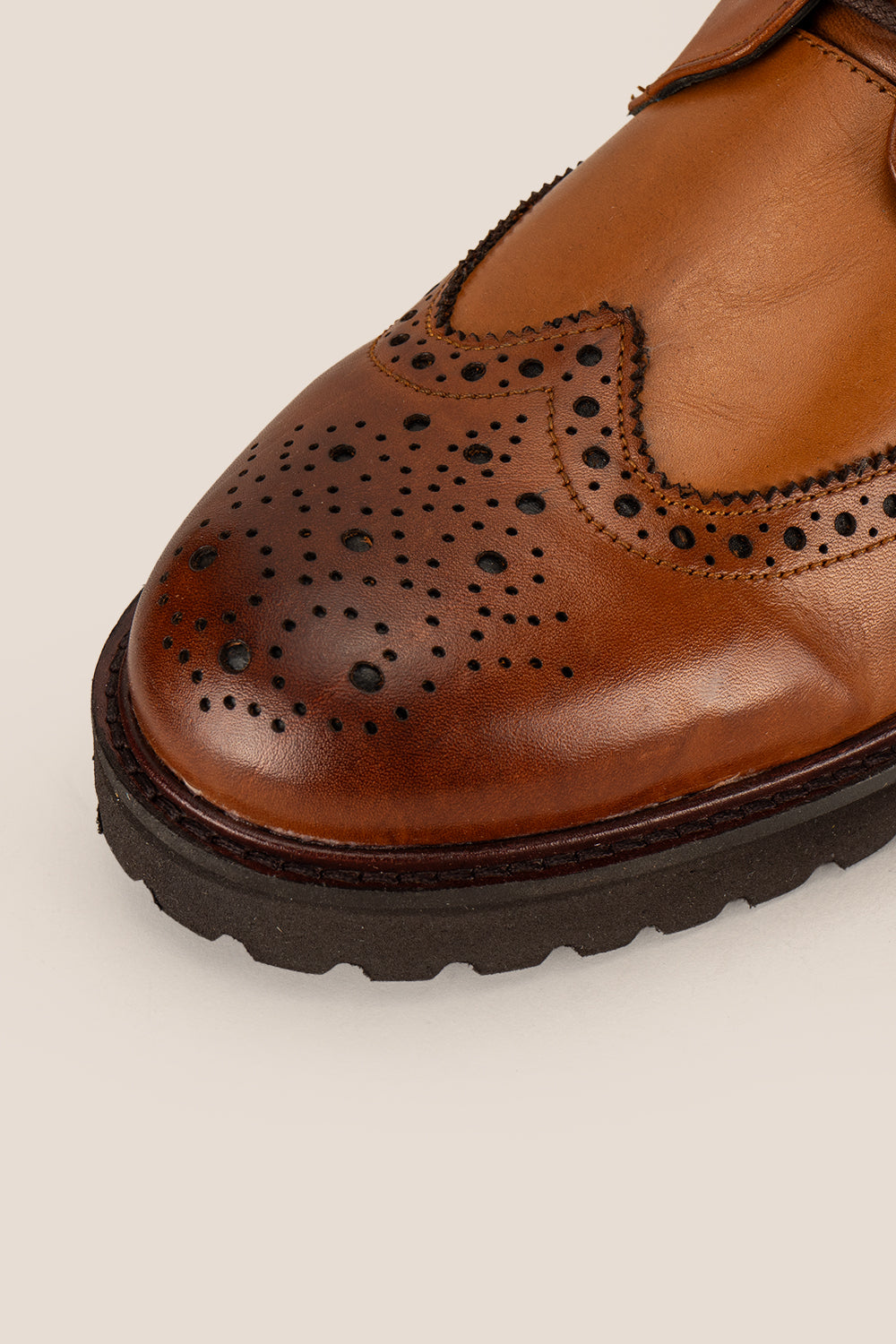 Graham tan leather brogue boots for men with classic perforated detailing, ideal for dressy and smart-casual occasions.