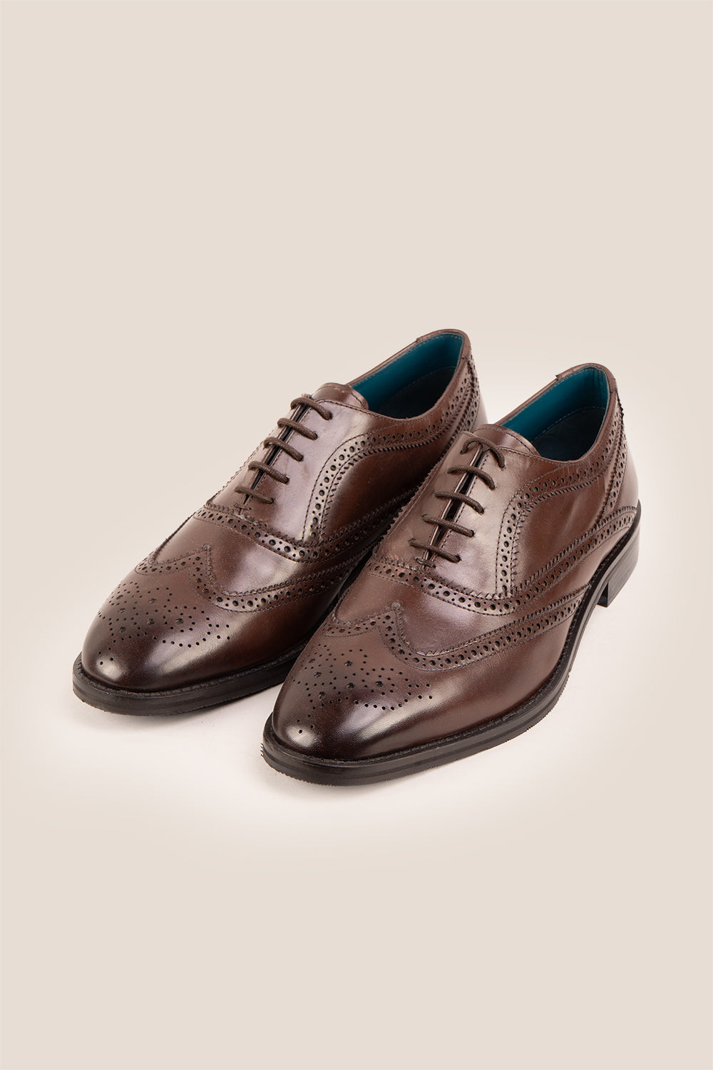 Stokes Brown Oxford Brogue Wing Cap leather shoes for men, crafted with premium brown leather and intricate brogue detailing for formal style.