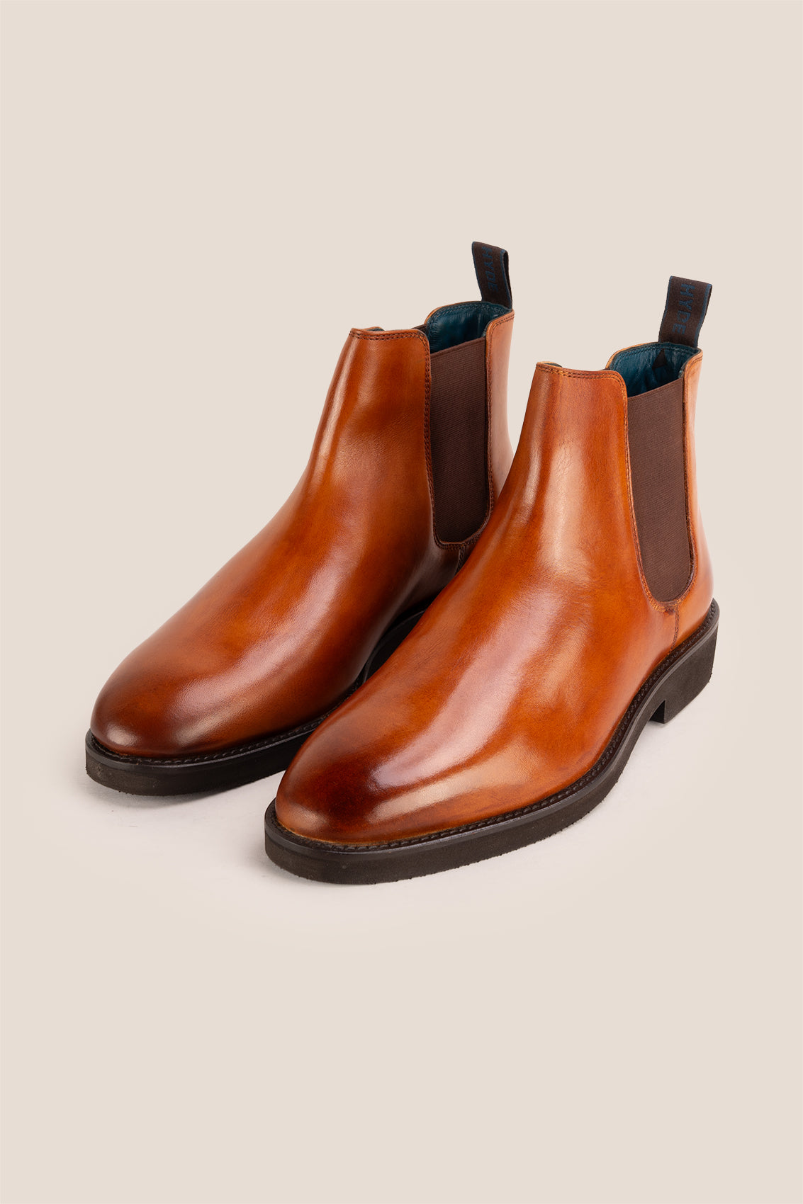 Michael tan leather Chelsea boots for men with elastic sides and pull tab, perfect for smart-casual and formal wear.