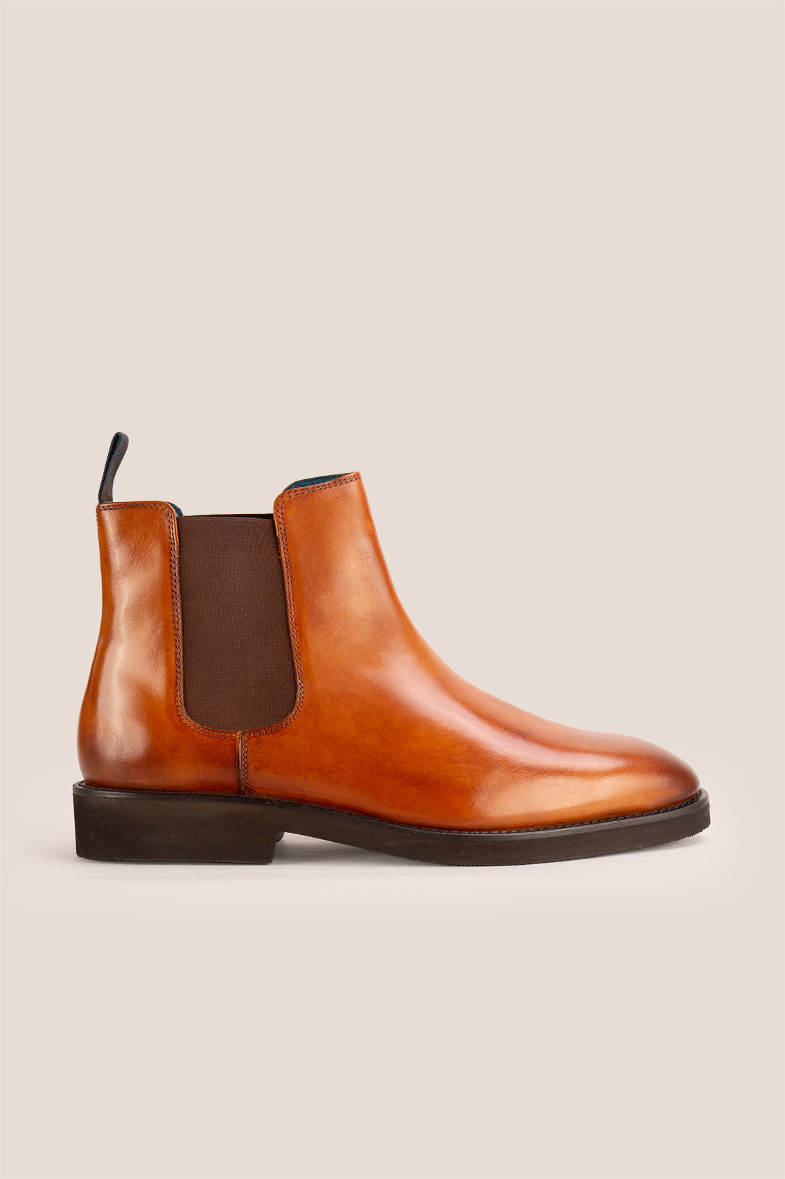 Michael tan leather Chelsea boots for men with elastic sides and pull tab, perfect for smart-casual and formal wear.