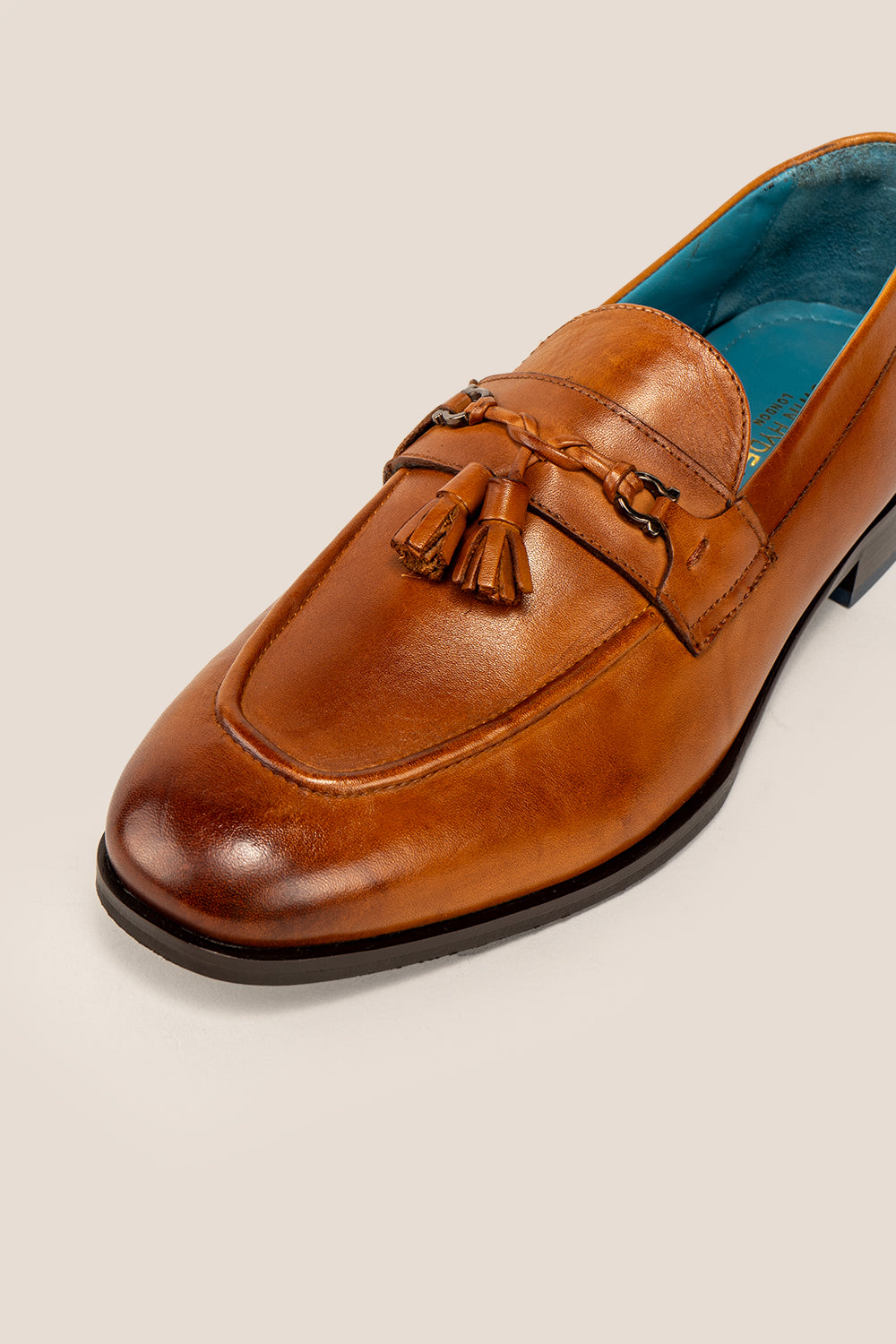 Emmet Tan men’s leather loafers featuring premium tan leather with tassel trim, ideal for formal and smart casual wear.