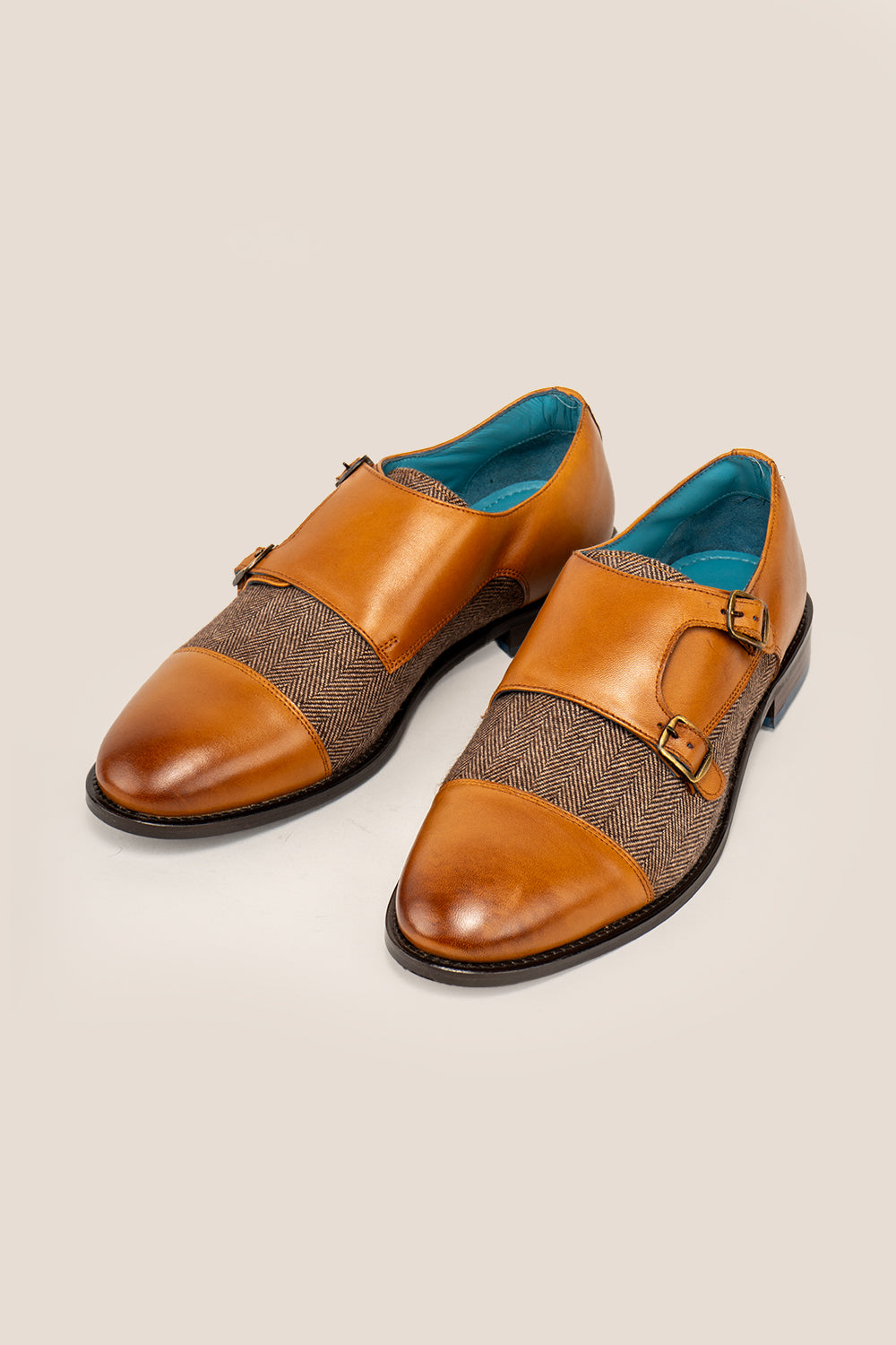 Oscar cognac monk strap men’s shoes crafted from premium leather with tweed accents, ideal for formal and smart-casual occasions.