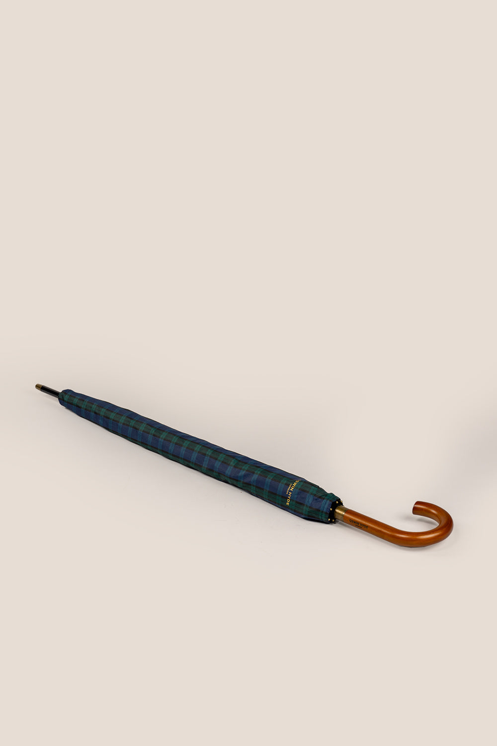 Jaxon Tartan men’s windproof umbrella featuring elegant tartan fabric and wooden J-handle, offering stylish and durable all-weather protection.