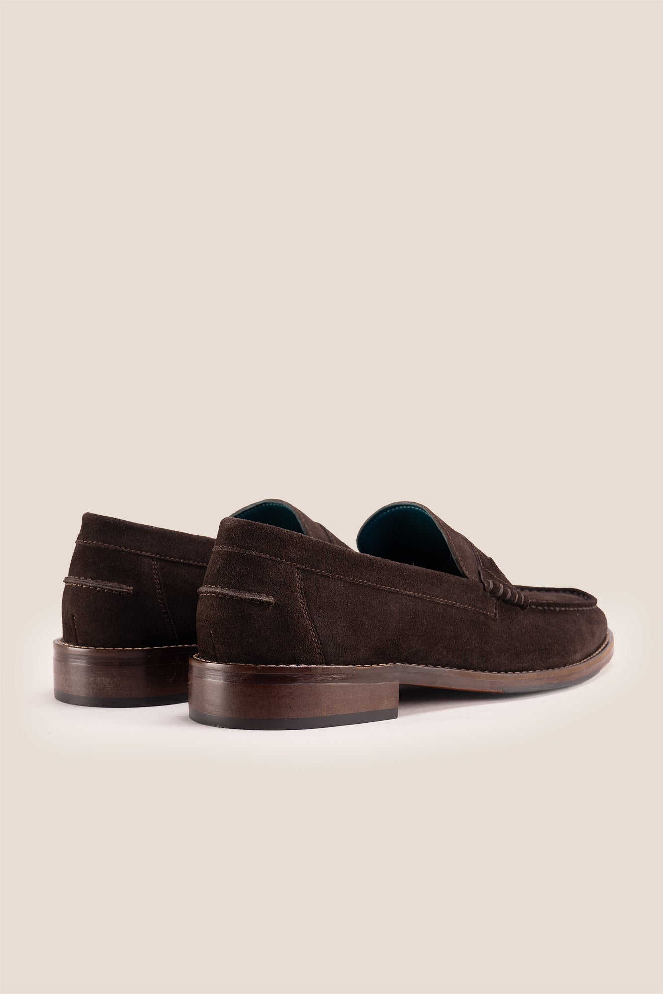 Peter Brown Suede leather penny loafers for men. Classic and stylish, these loafers provide comfort, durability, and a refined look for any occasion.
