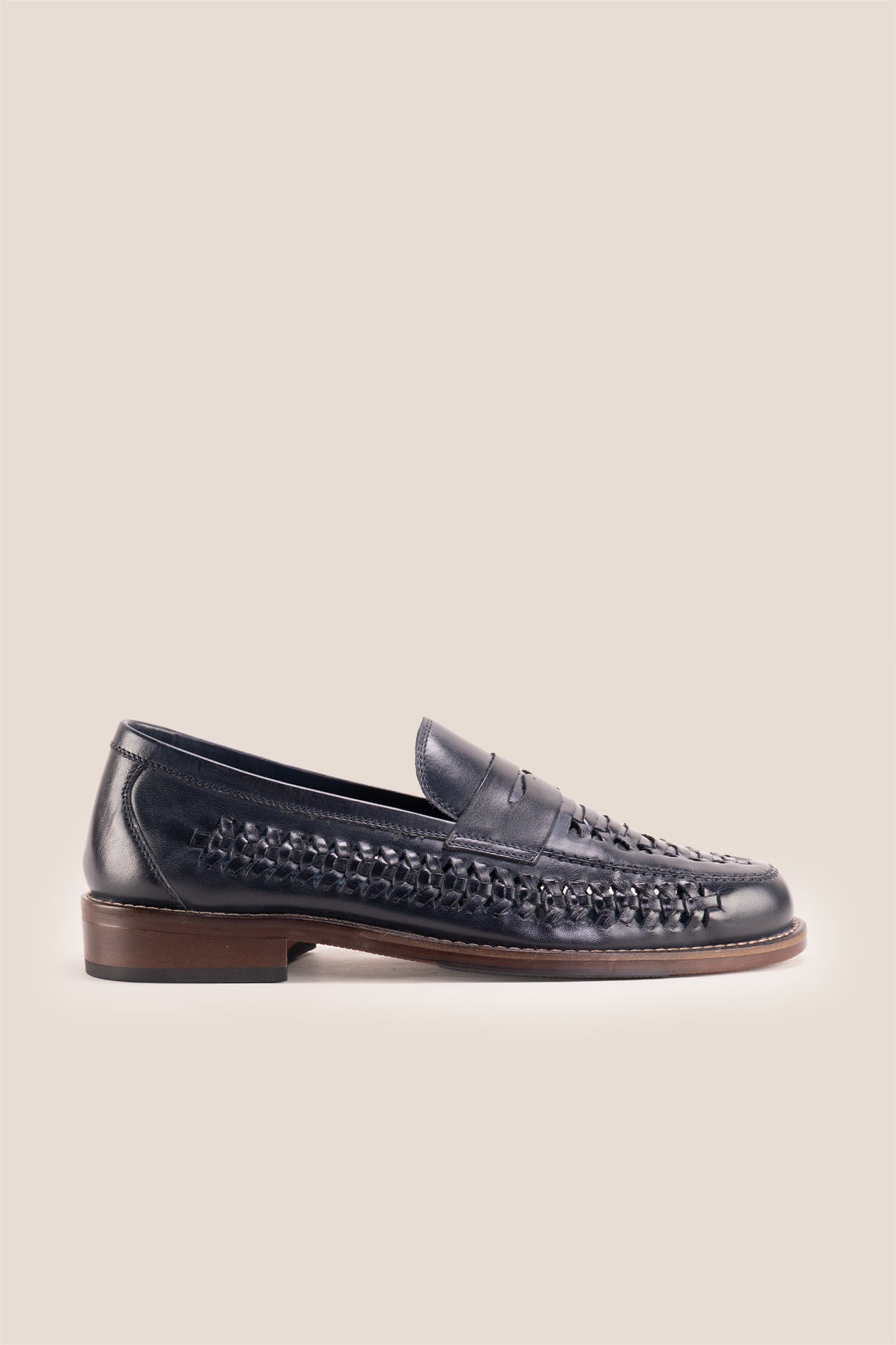 Finley navy woven leather loafers for men, featuring premium craftsmanship, intricate weave detail, and a refined, durable finish