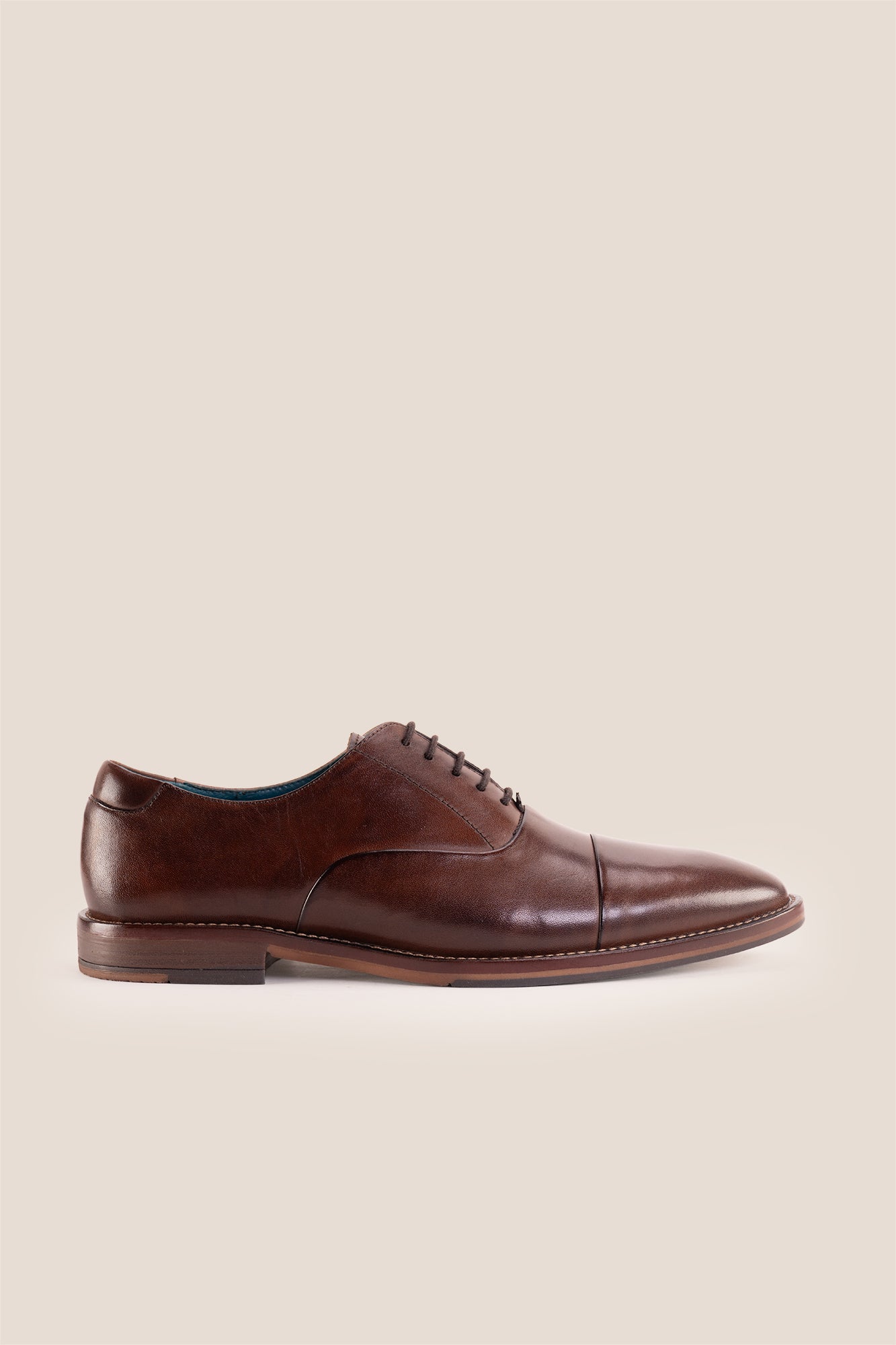 Jarred Brown mens premium leather Oxford shoes featuring a distinctive toecap design and a polished brown finish.