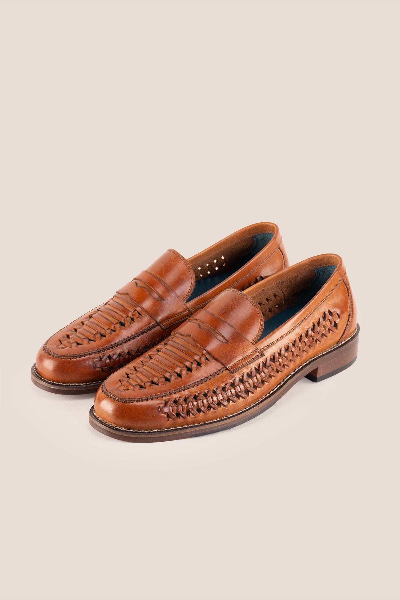 Finley tan woven leather loafer for men, showcasing premium craftsmanship with a sophisticated and timeless design