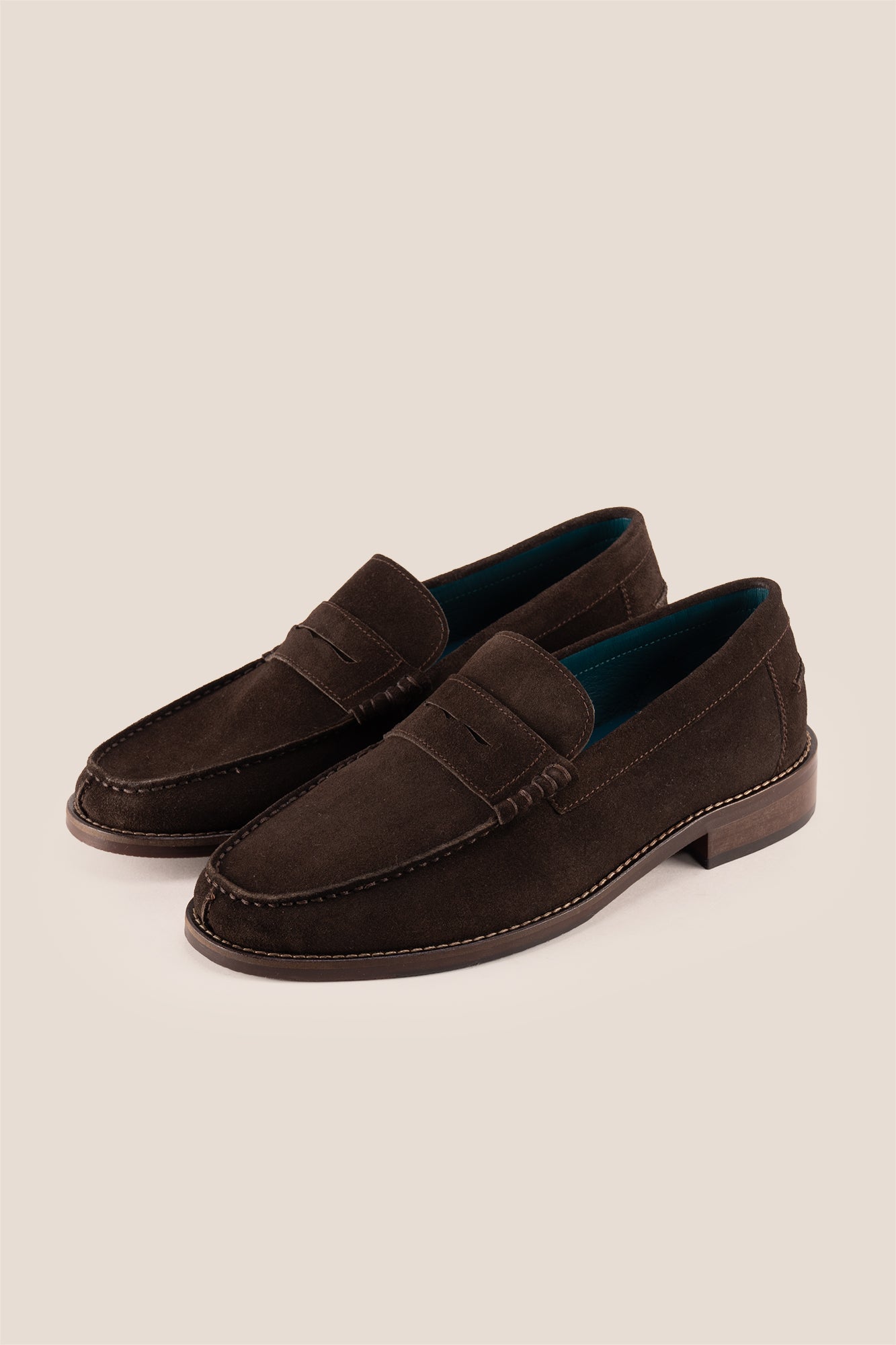 Peter Brown Suede leather penny loafers for men. Classic and stylish, these loafers provide comfort, durability, and a refined look for any occasion.
