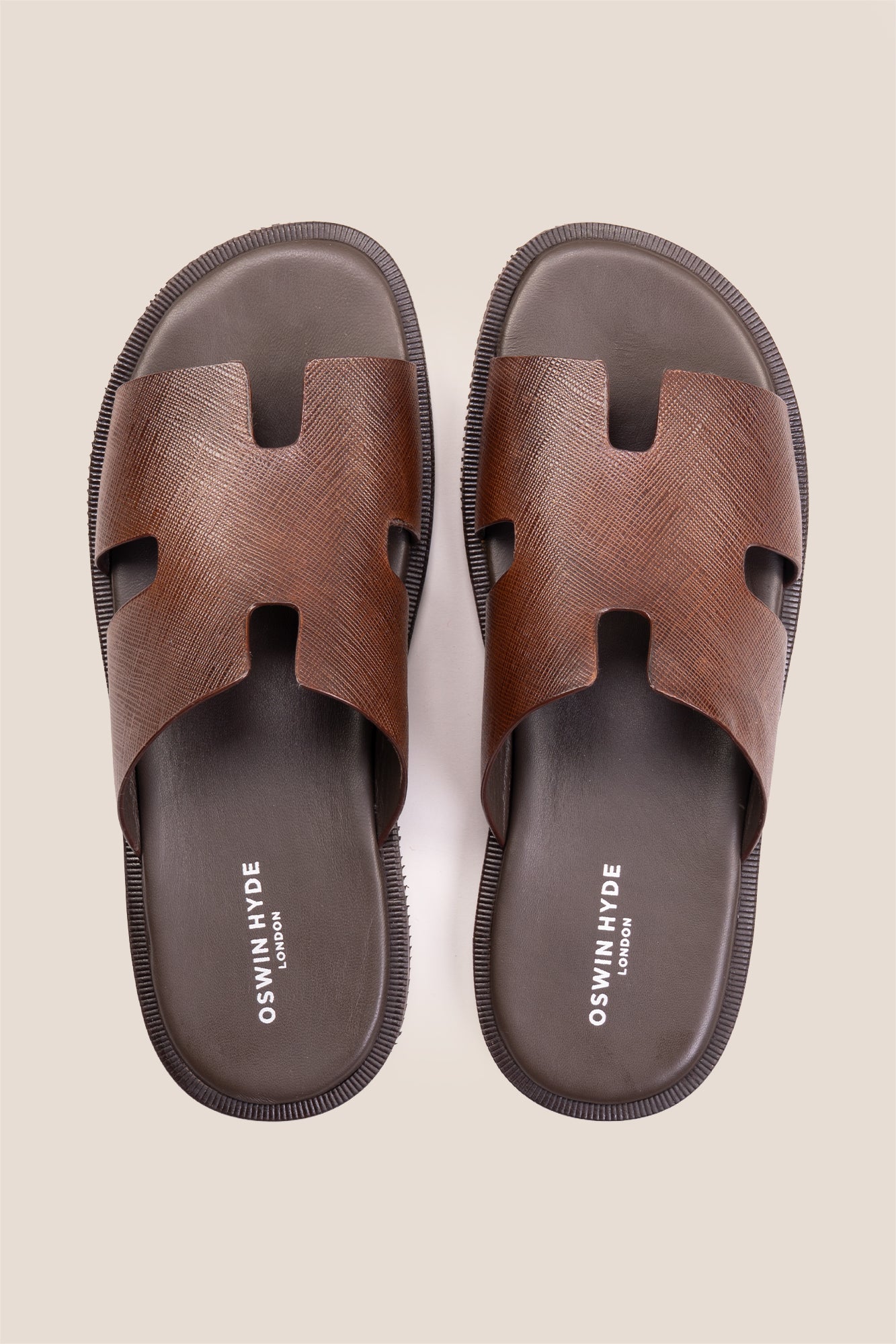 Men’s Phoenix Brown sandals in high-quality brown leather featuring a minimalist hyde strap H-frame design.