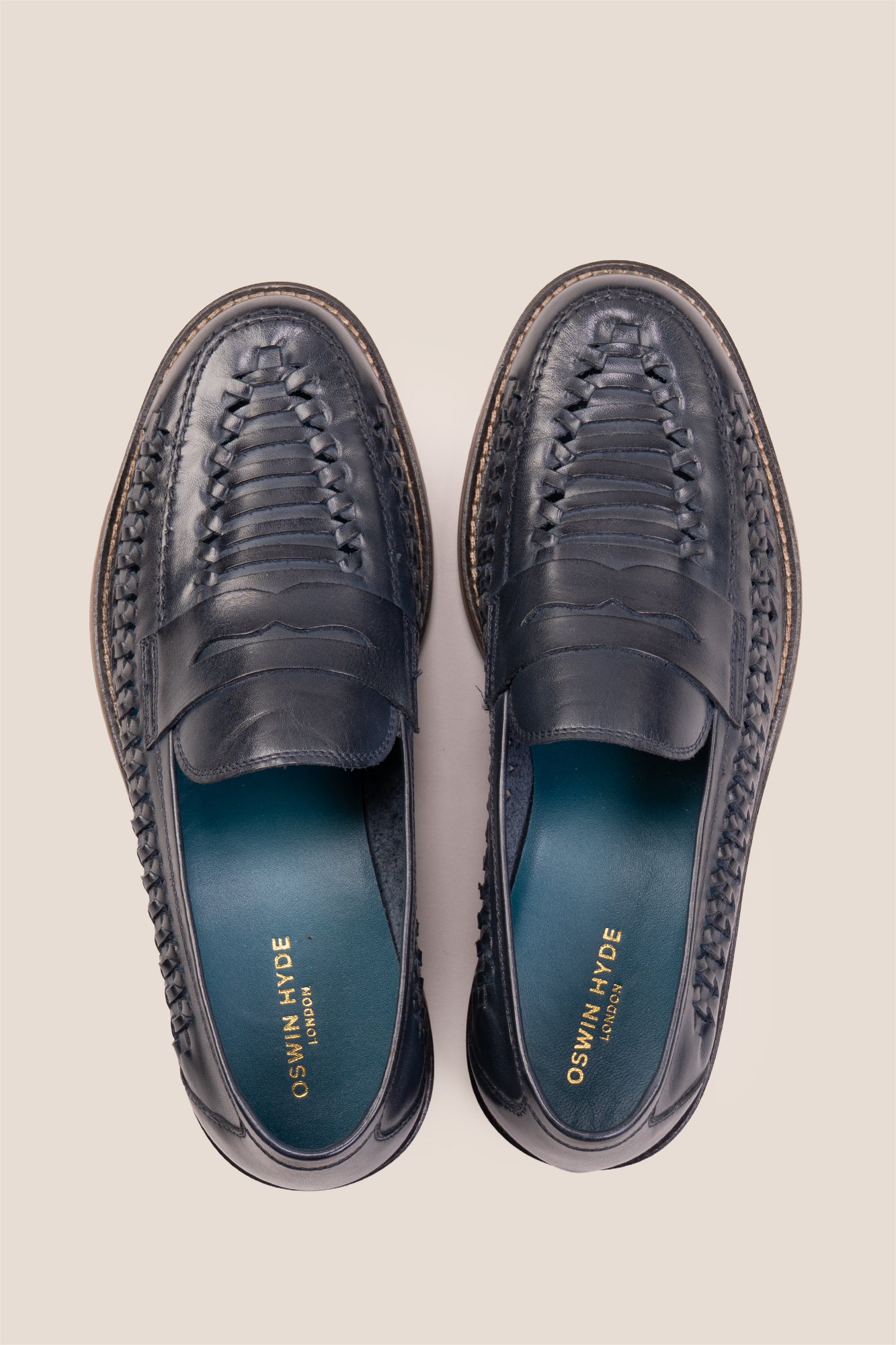 Finley navy woven leather loafers for men, featuring premium craftsmanship, intricate weave detail, and a refined, durable finish