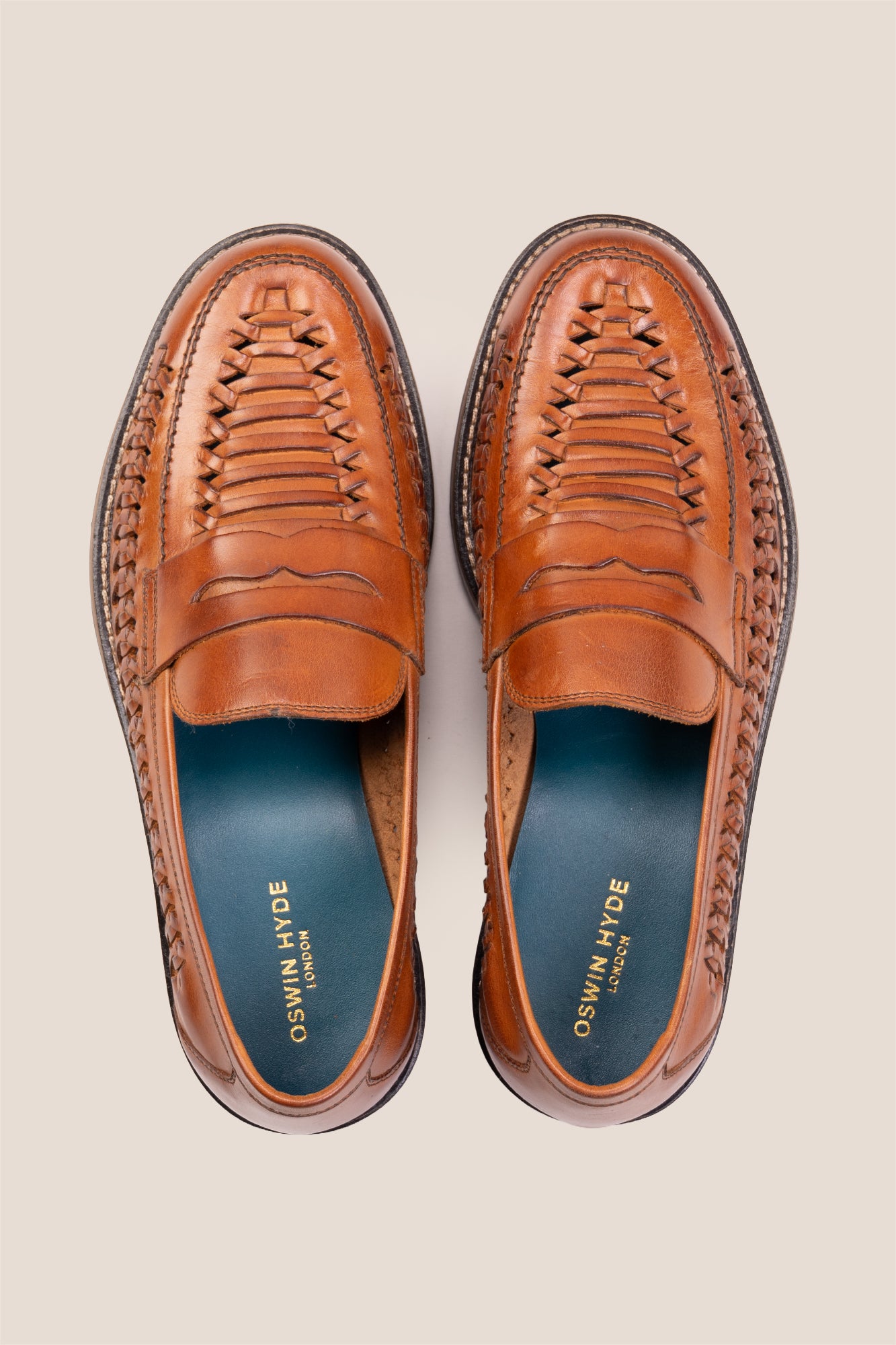 Finley tan woven leather loafer for men, showcasing premium craftsmanship with a sophisticated and timeless design