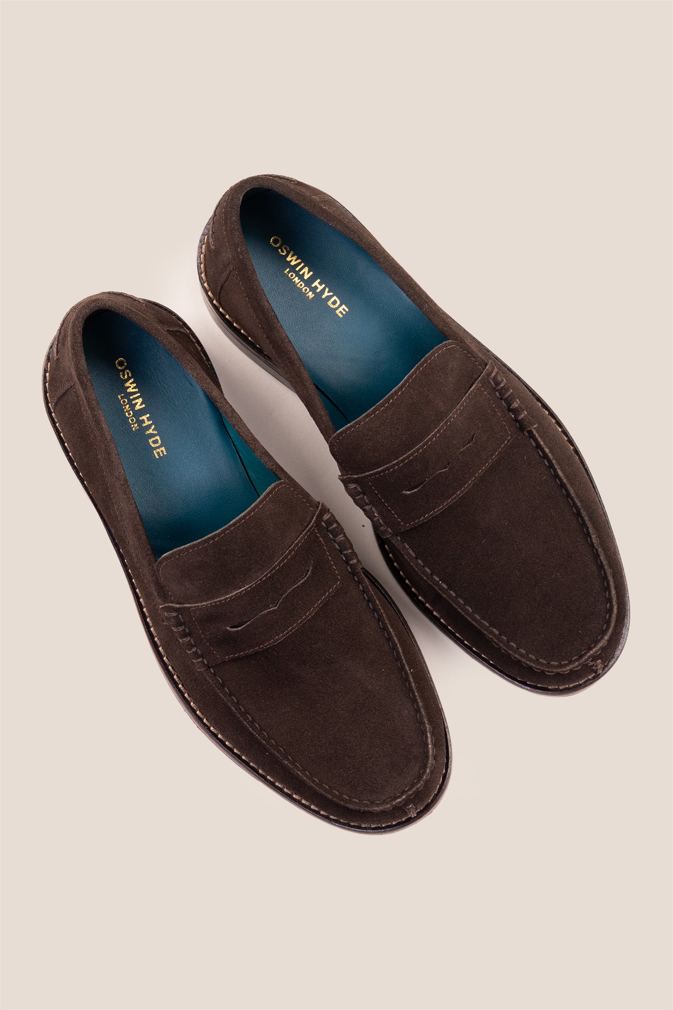 Peter Brown Suede leather penny loafers for men. Classic and stylish, these loafers provide comfort, durability, and a refined look for any occasion.