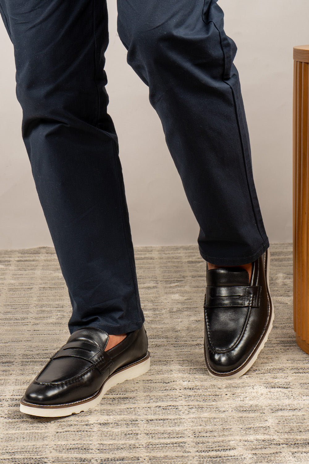 Bryan Black leather loafer for men crafted from premium leather, offering classic style and comfort for formal and smart casual wear.