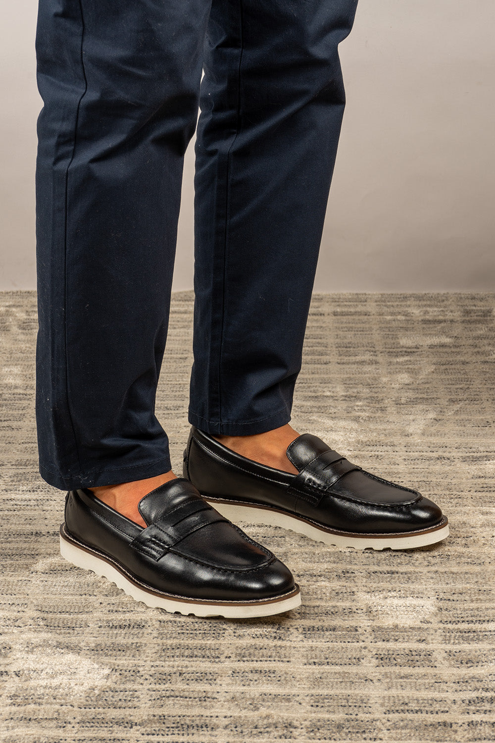 Bryan Black leather loafer for men crafted from premium leather, offering classic style and comfort for formal and smart casual wear.