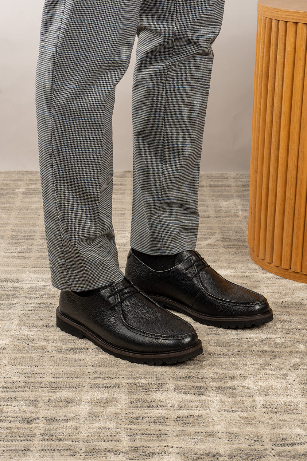 Joshua black leather Wallabee shoes for men by Oswin Hyde – casual luxury footwear with moccasin-style stitching and premium comfort.