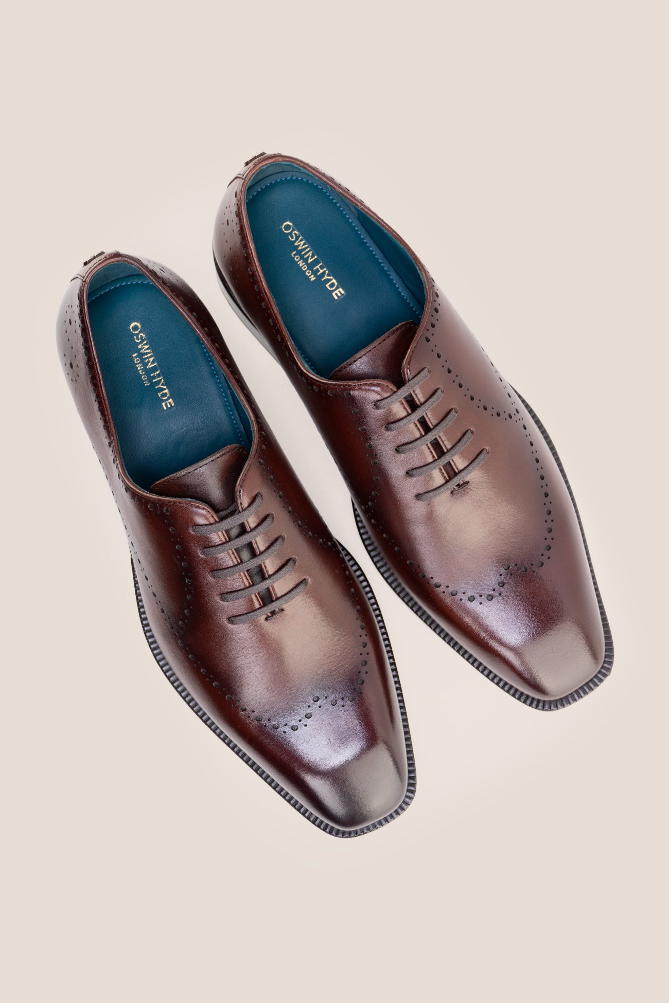 The men's smart brown shoes combine rich leather tones with versatile open-lacing, perfect for business tailoring and smart-casual occasions.