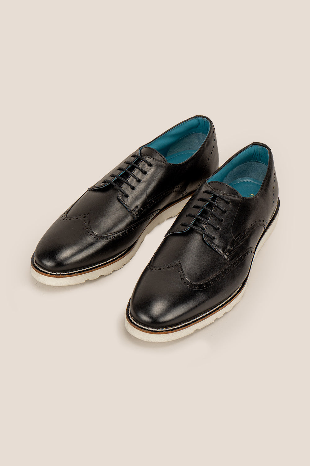 Conner Black derby trainers for men made from premium leather, featuring stylish design ideal for casual and formal wear.