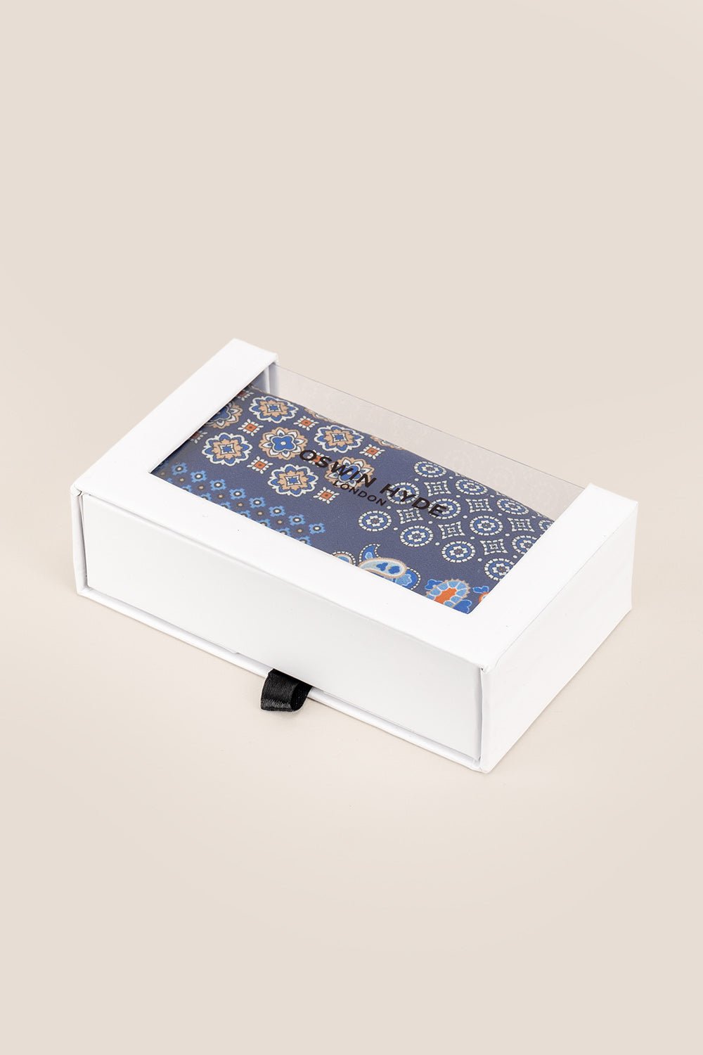 Men’s navy silk pocket square handkerchief with four versatile folds and intricate pattern, ideal for weddings, formal occasions, or smart casual wear.