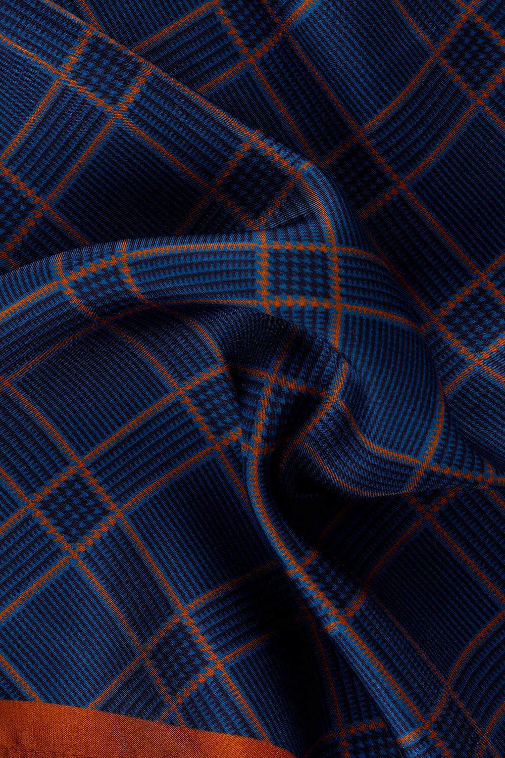 Men’s navy silk handkerchief with symmetrical line detailing and elegant finish, perfect for weddings, formal occasions or refined everyday wear.