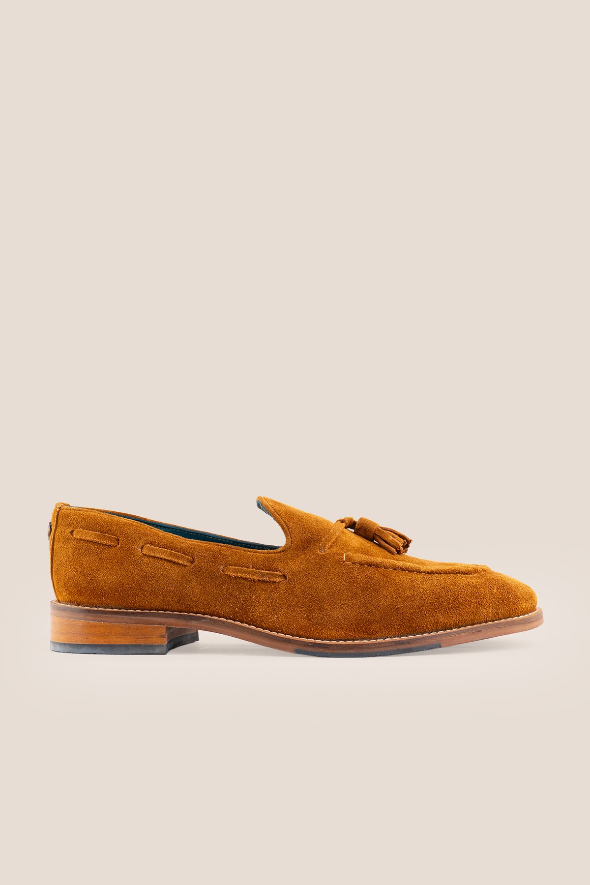 Men's Issac Tobacco Suede tassel loafers crafted from premium suede with a cushioned footbed and slip-on design.