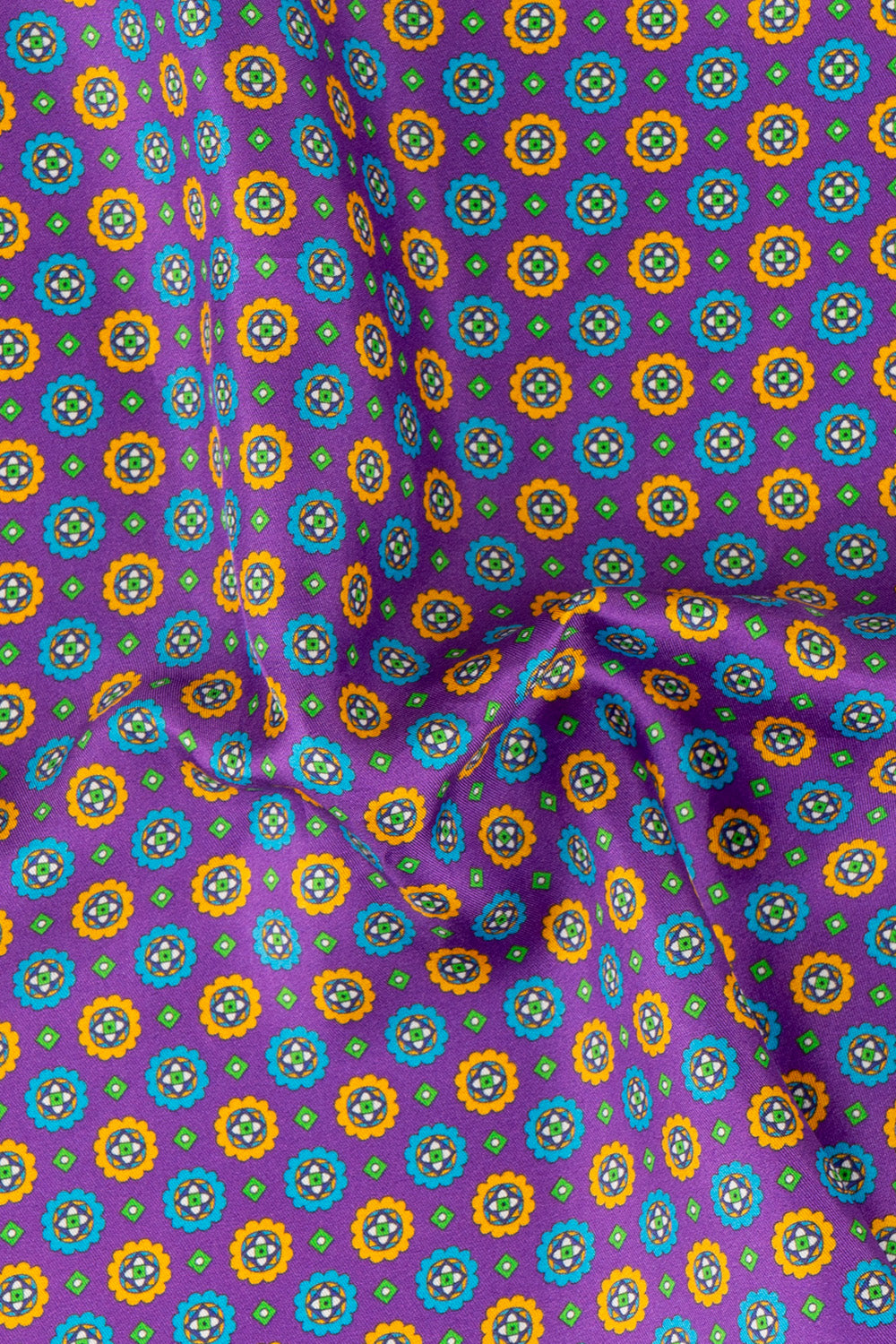 Men’s purple silk handkerchief with an intricate geometric pattern, ideal for weddings, smart occasions, or elevated everyday styling.