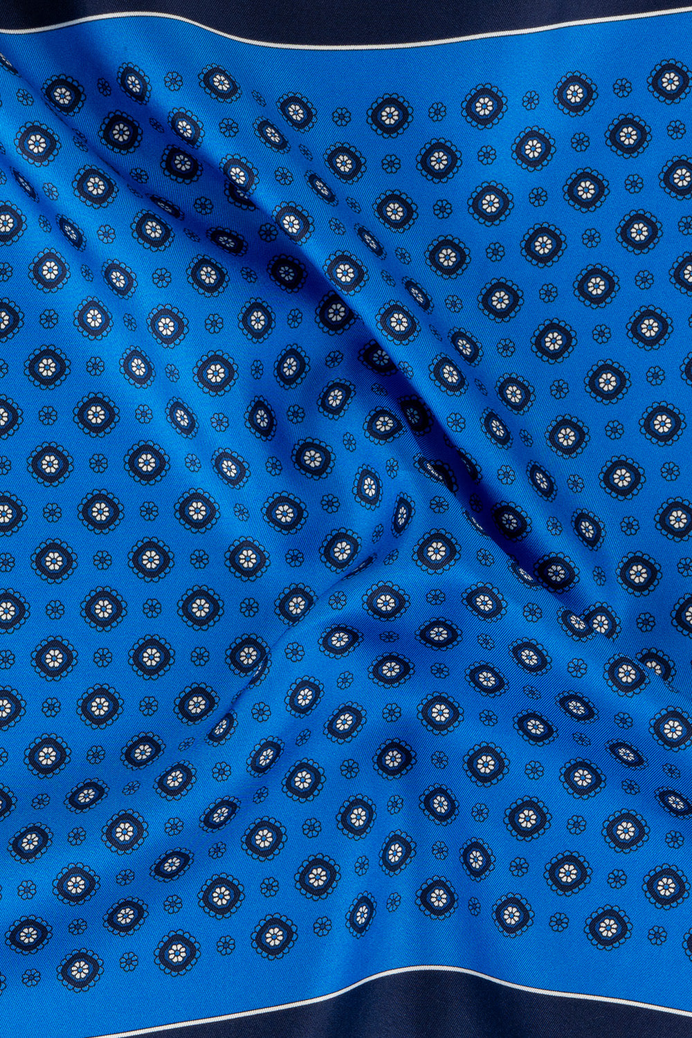Men’s navy silk handkerchief with an intricate geometric pattern, crafted for wedding, formal, or elegant smart attire.