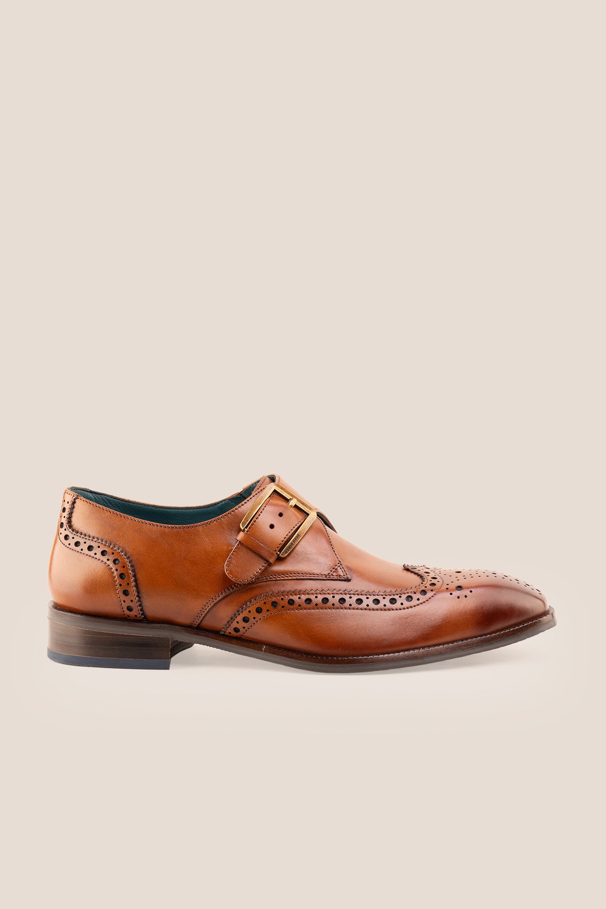 Men's Godric Tan leather monk strap brogue dress shoes by Oswin Hyde featuring burnished tan leather and a buckle strap.