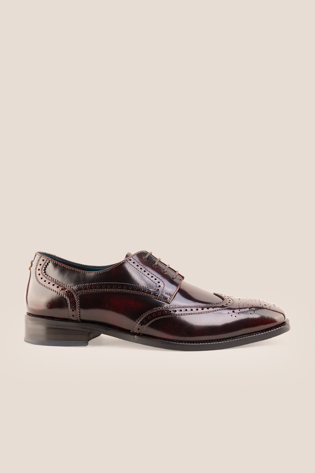 Men's Gabriel Bordo leather wingtip Derby dress shoes by Oswin Hyde featuring rich burgundy leather and lace-up closure.