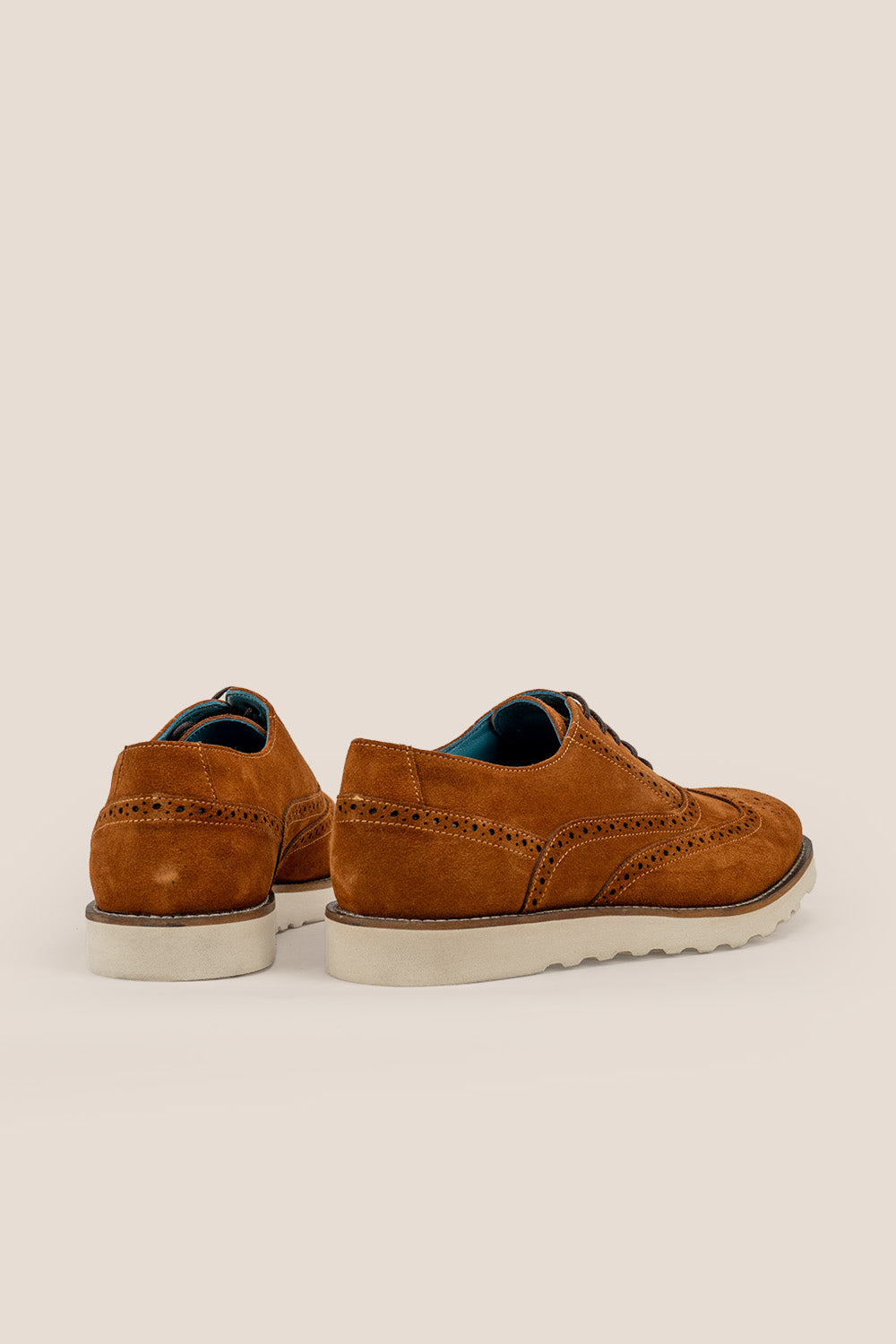 Men’s Tyler oxford brogue trainers in tobacco suede with classic perforated details and rubber sole—a refined twist on modern casual footwear.