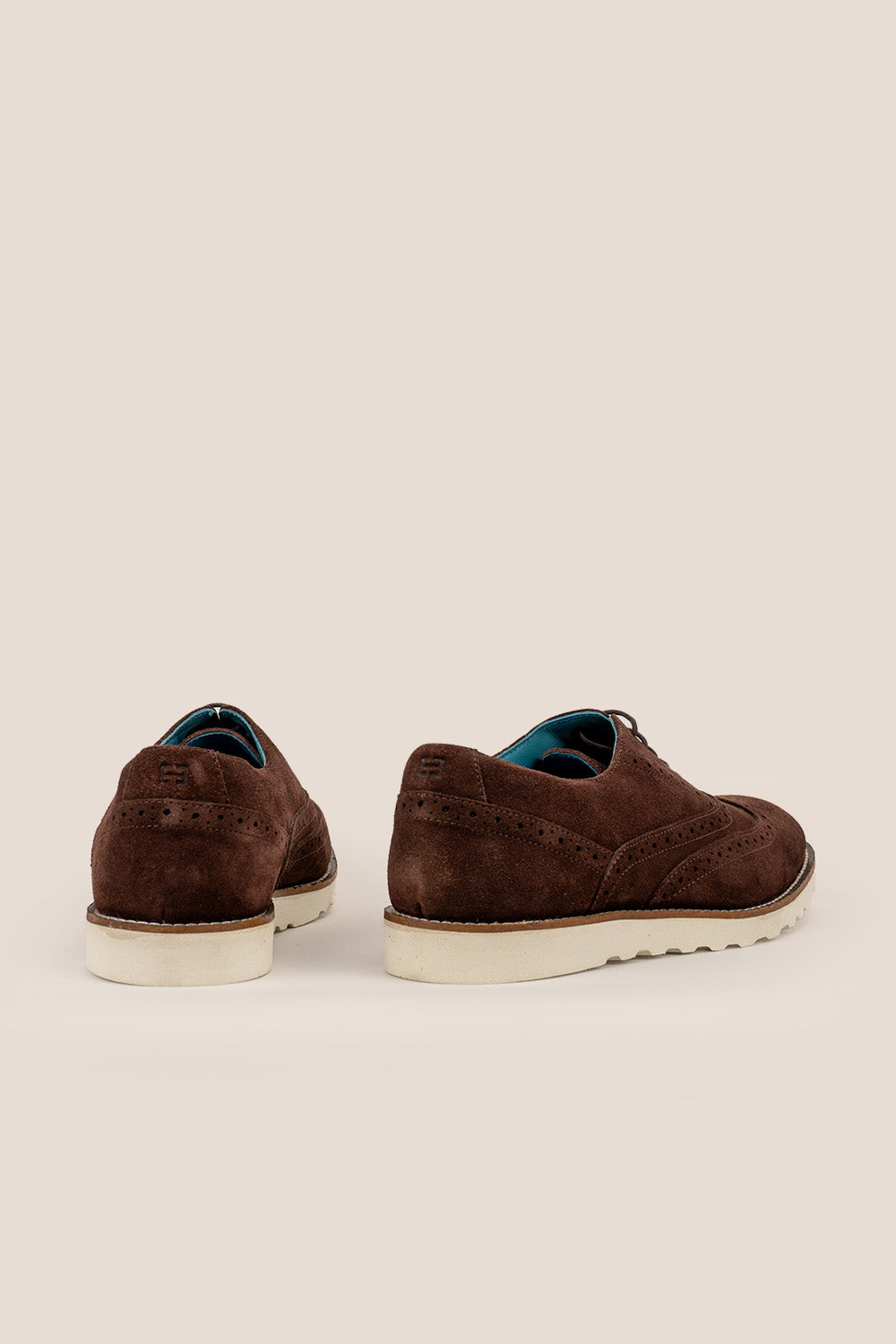 Men’s Tyler brown suede Oxford brogue trainers featuring detailed perforations, lace-up design, and sporty sole—smart and versatile for daily wear.