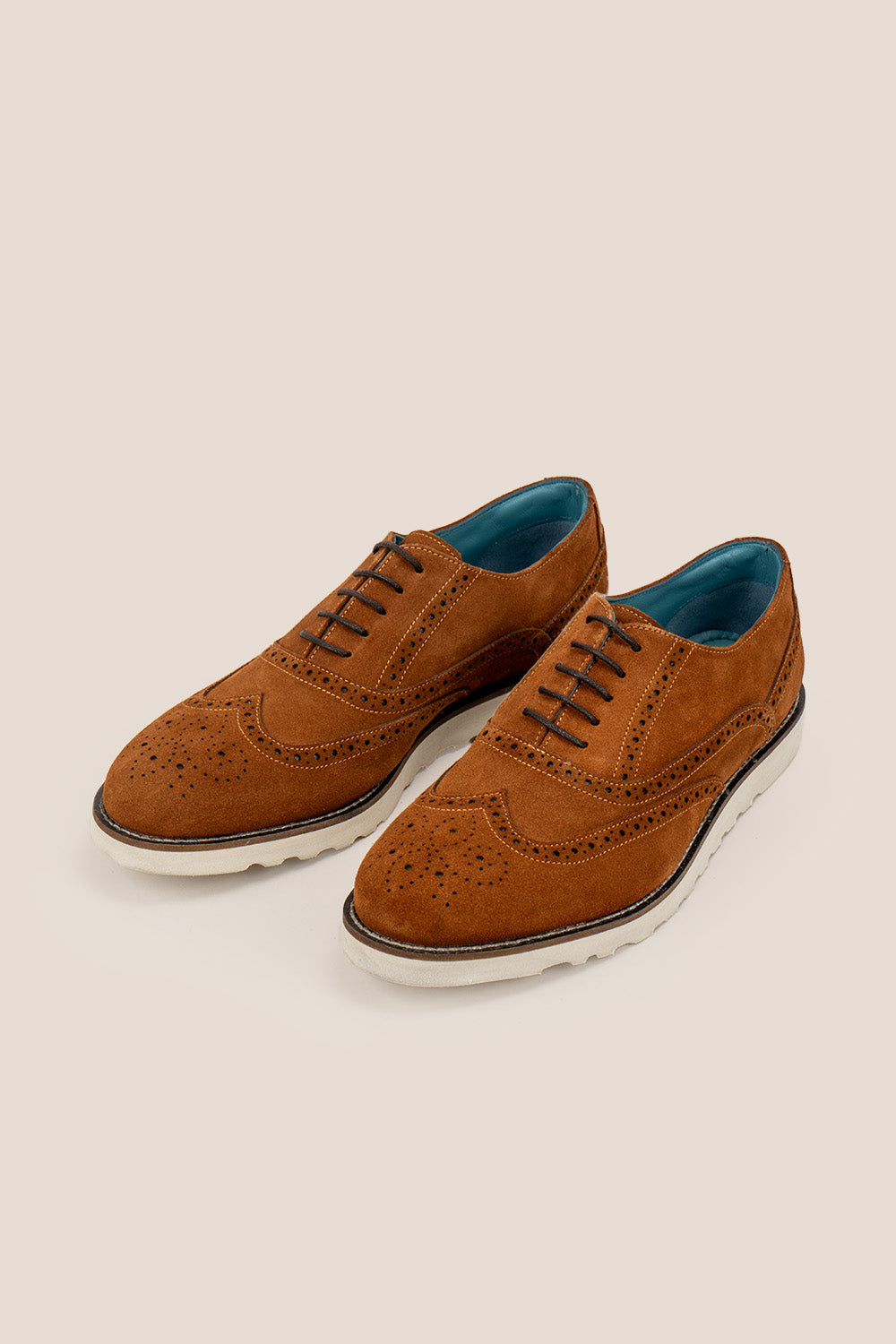 Men’s Tyler oxford brogue trainers in tobacco suede with classic perforated details and rubber sole—a refined twist on modern casual footwear.